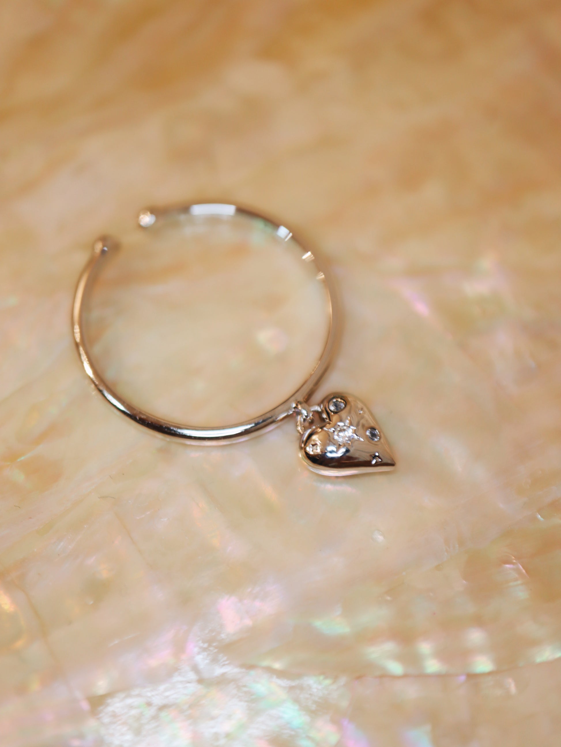 Drop cz heart open size ring
