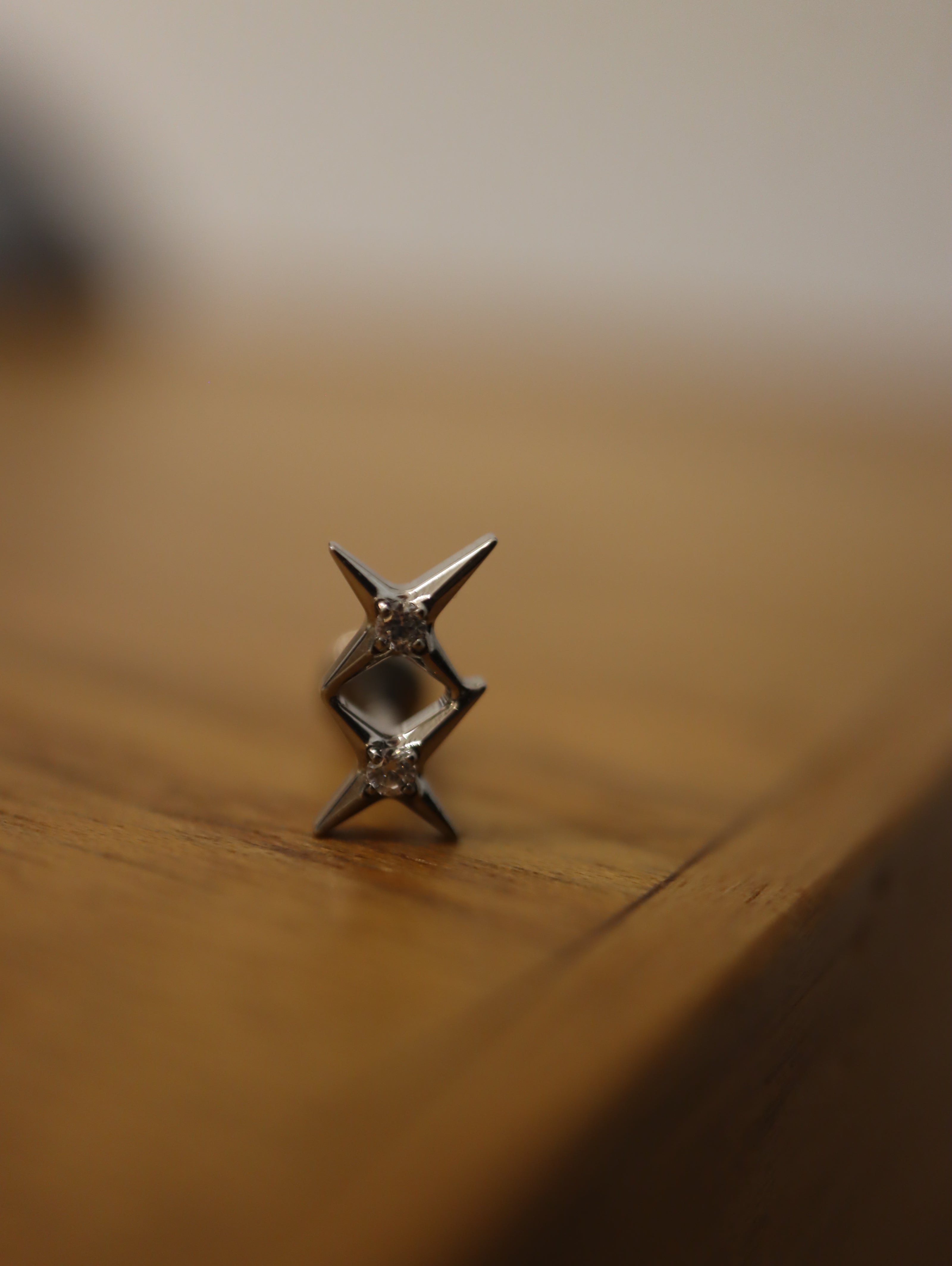 Titanium G23 Double star cz earring (1pc)