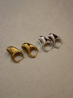 Irregular hoop brass earrings