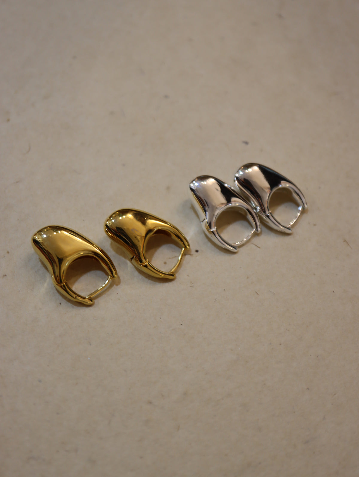 Irregular hoop brass earrings