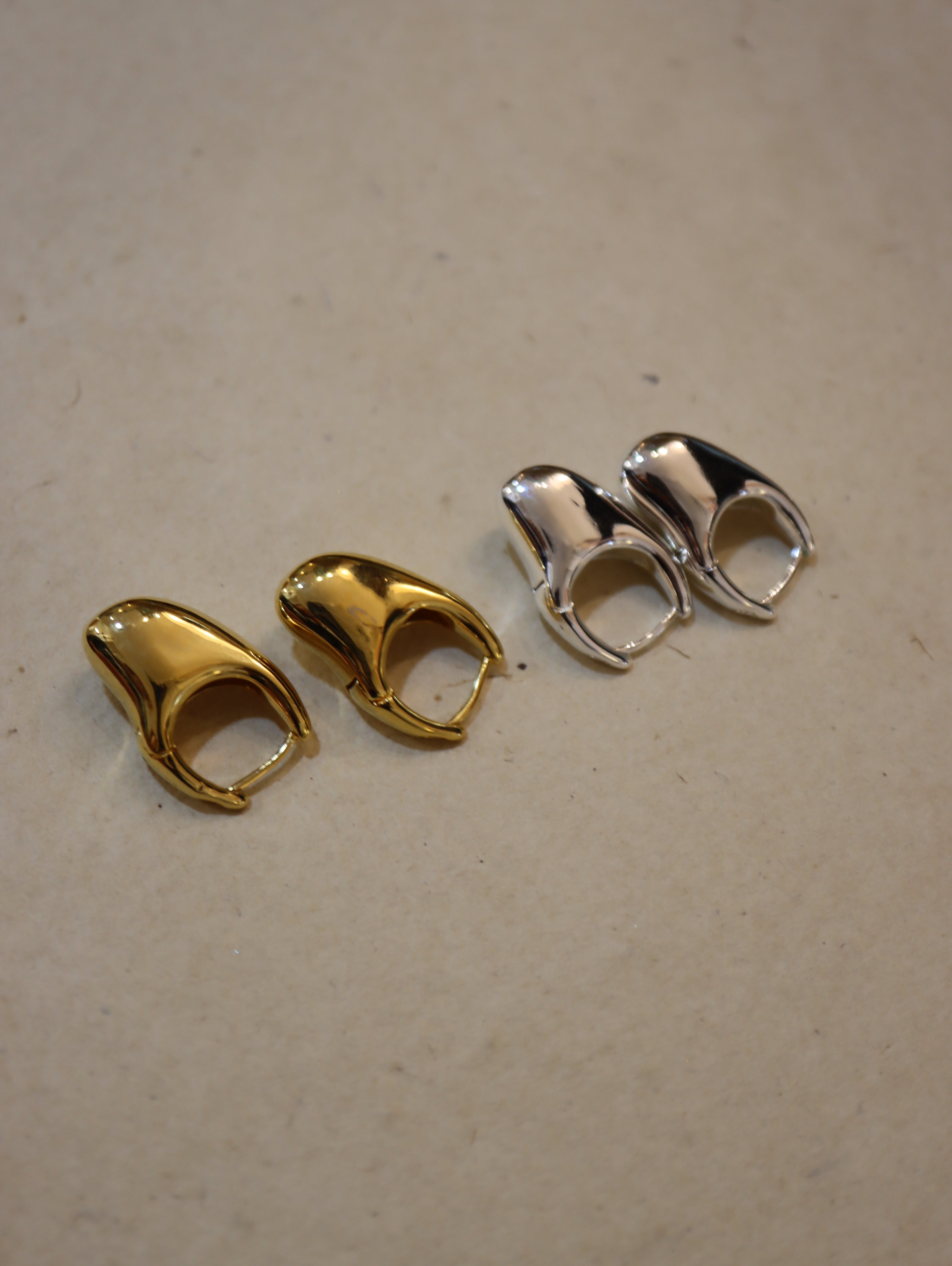 Irregular hoop brass earrings