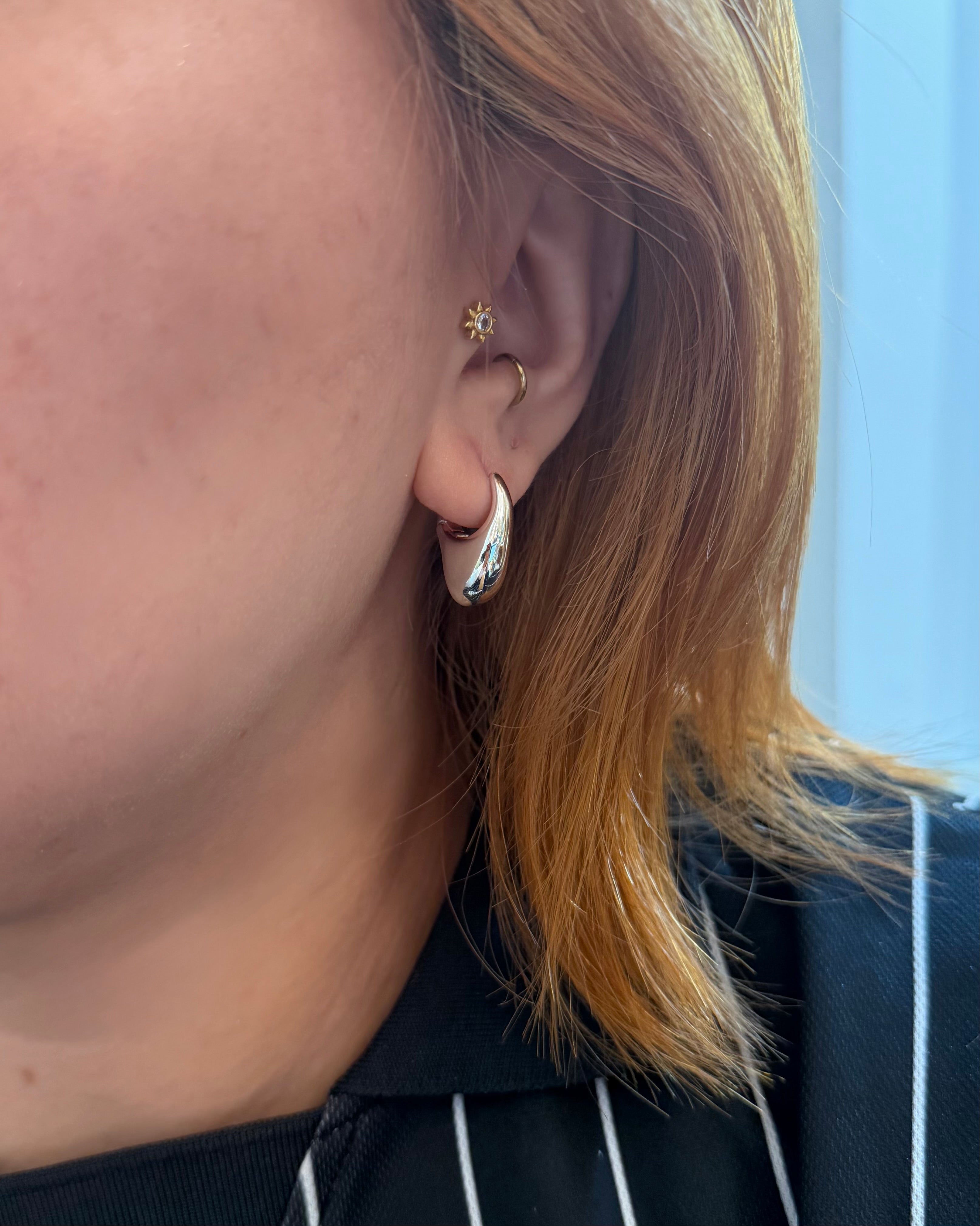 Irregular hoop brass earrings
