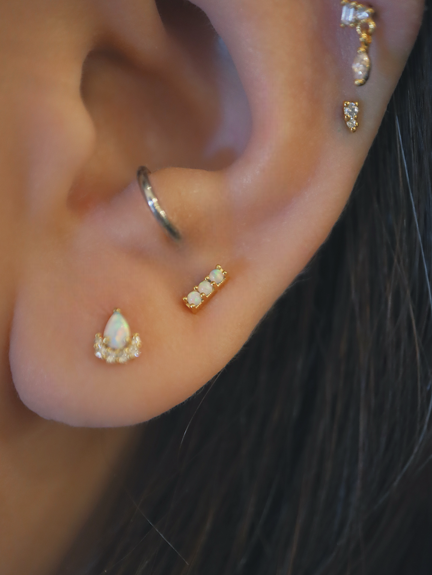 Triple opal flat back piercing
