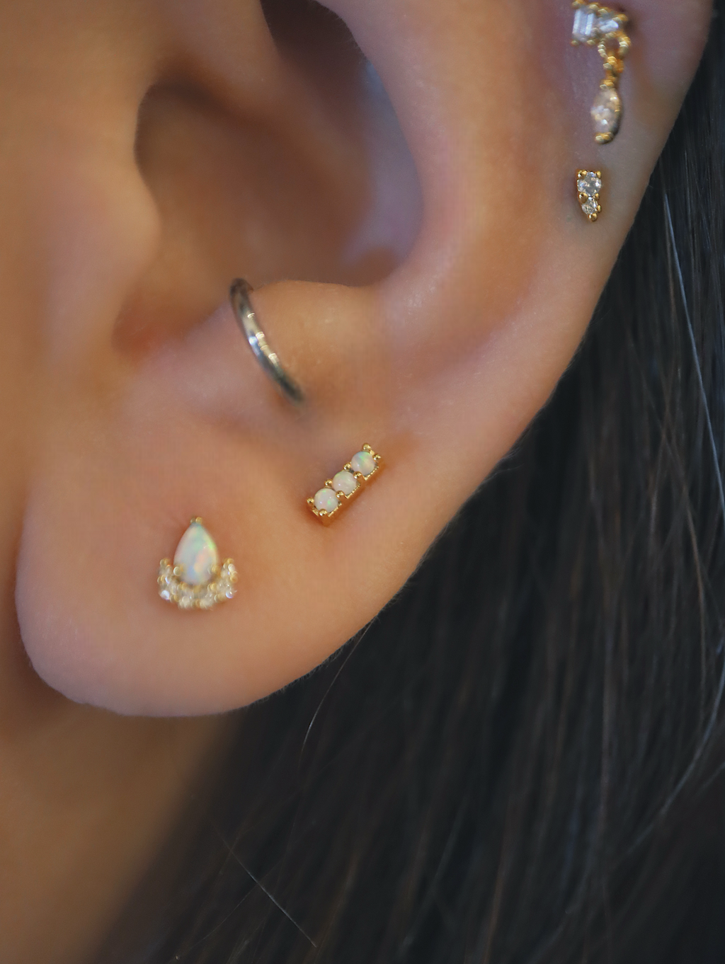 Triple opal flat back piercing