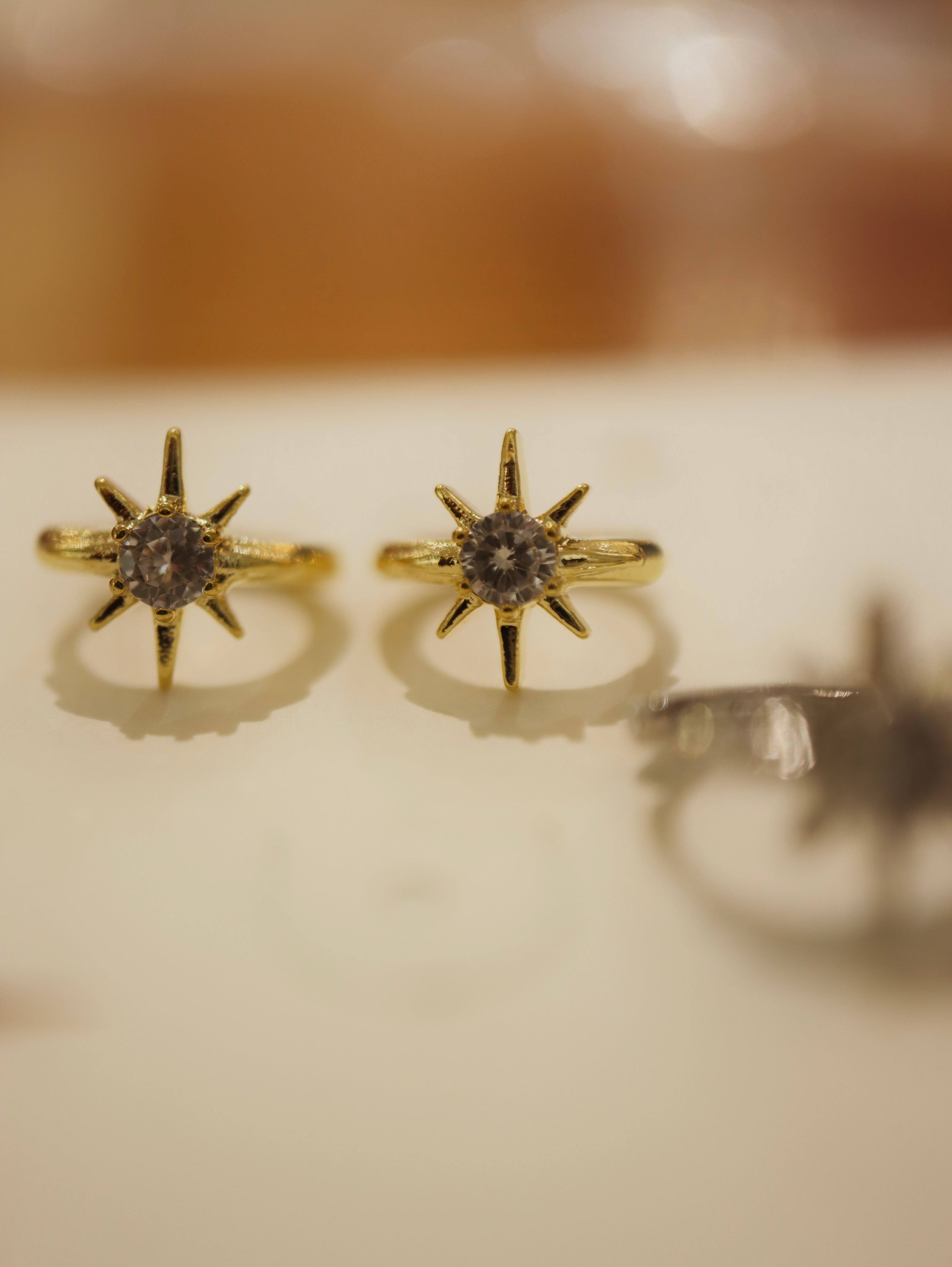 Solaris Star Hinged Hoop Earrings