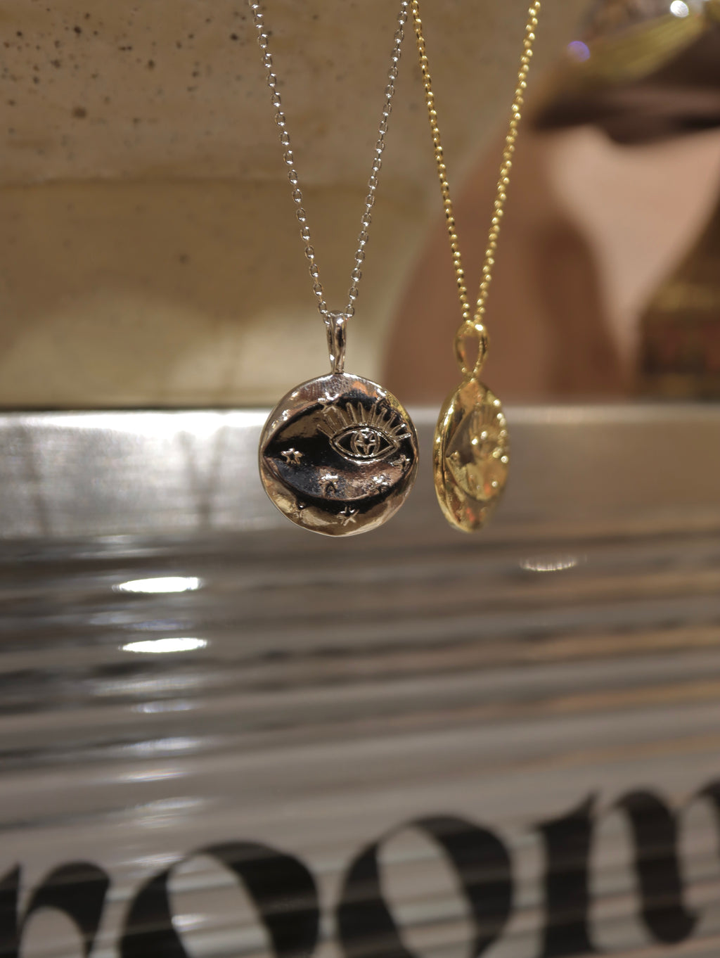 Eye coin brass necklace