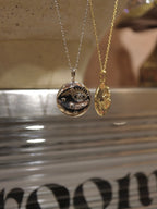 Eye coin brass necklace