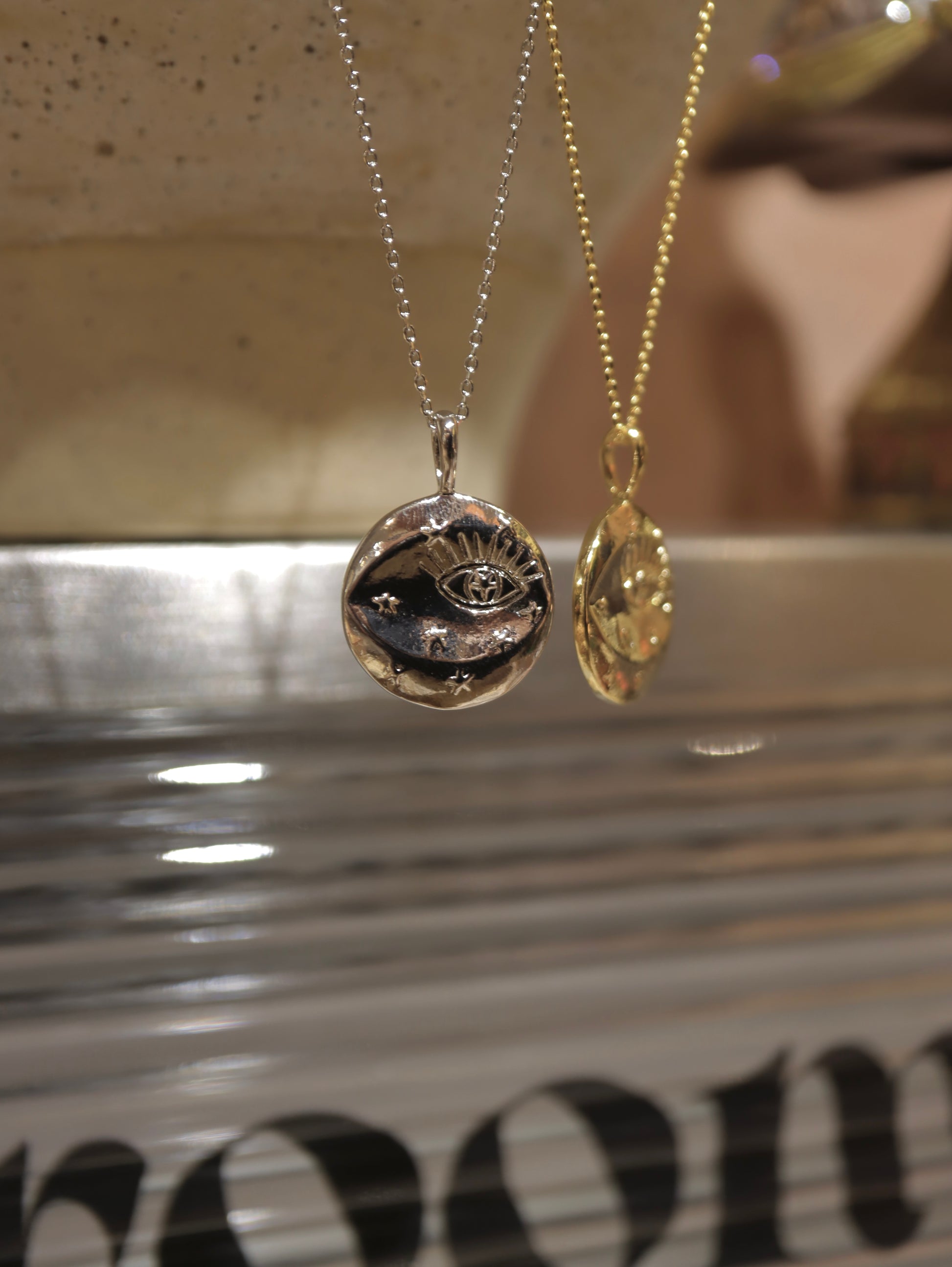 Eye coin brass necklace