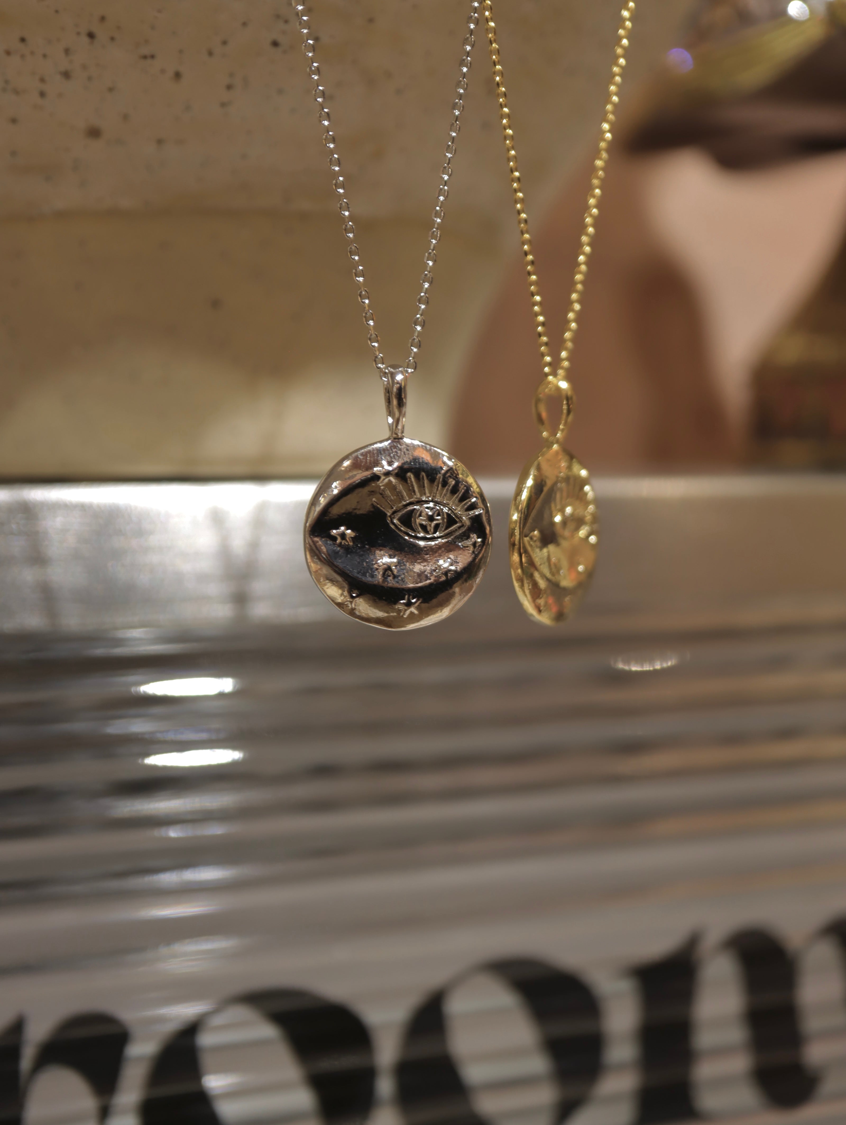 Eye coin brass necklace