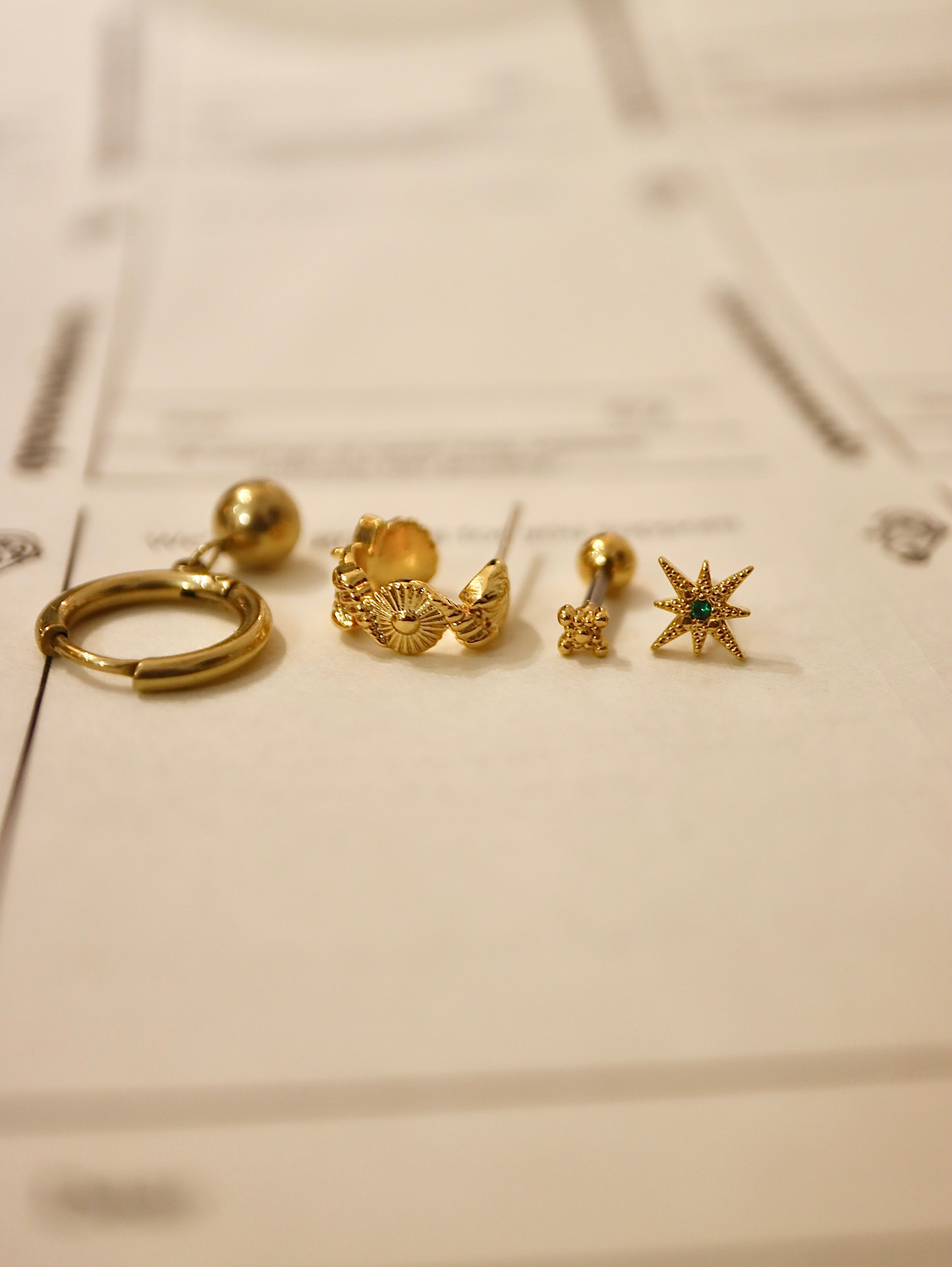 Solis textured hoop brass earrings