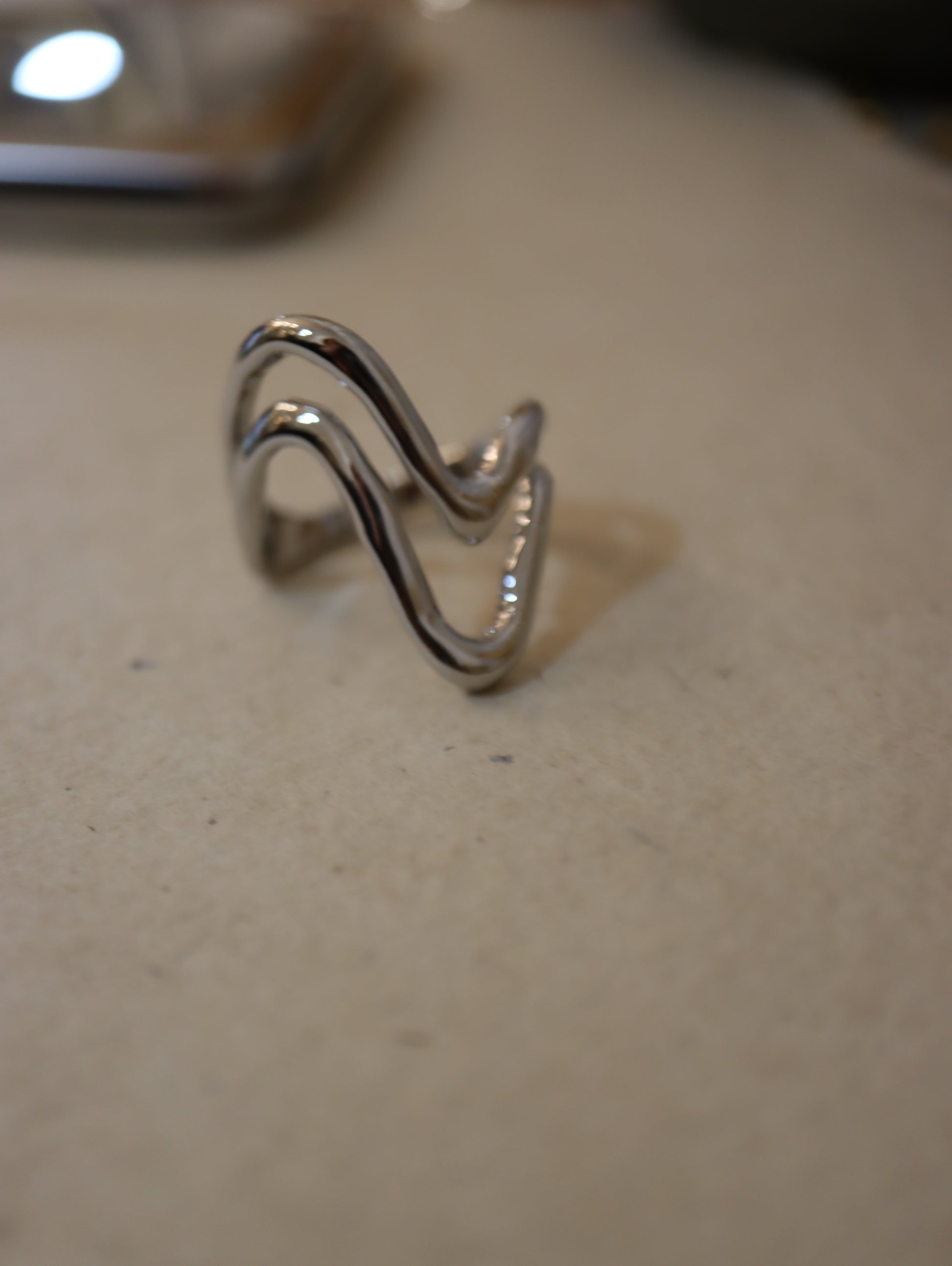 Wavy bold brass ring