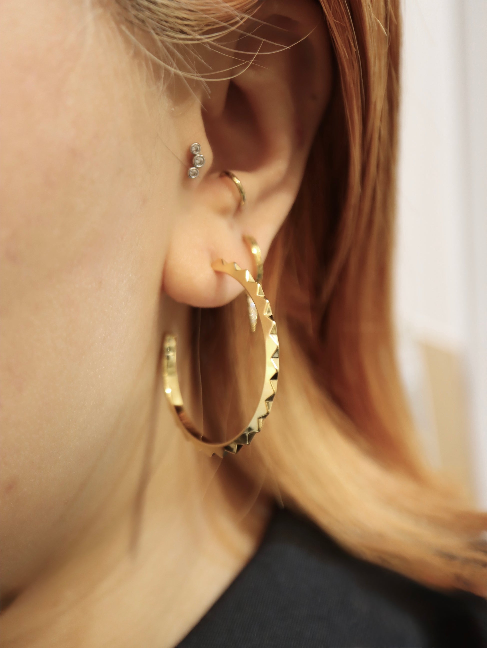 Pyramid-Studded hoop earrings