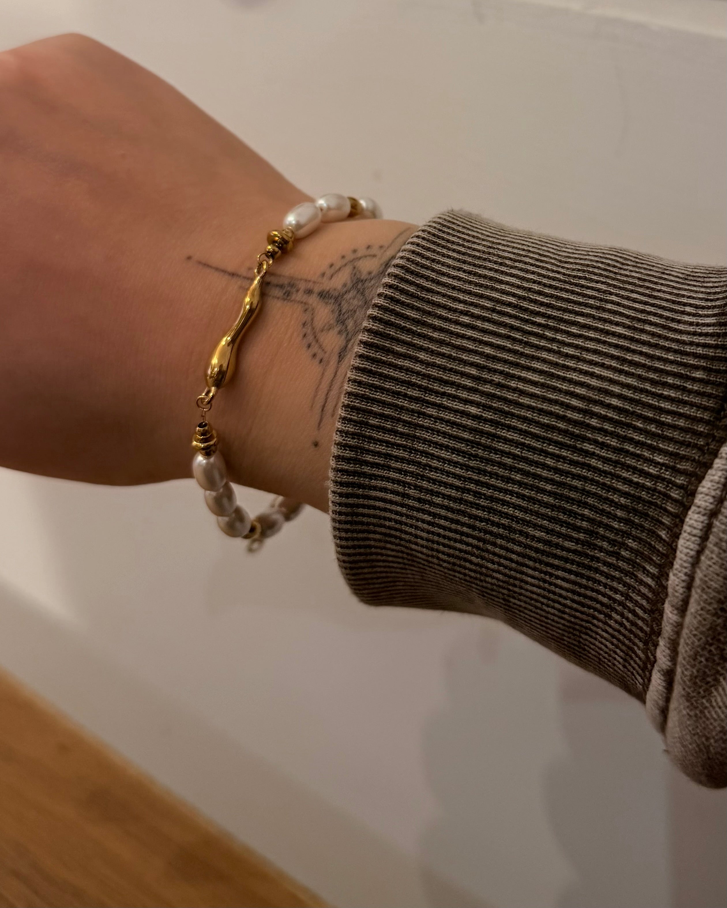 Golden beads & pearls stainless steel bracelet