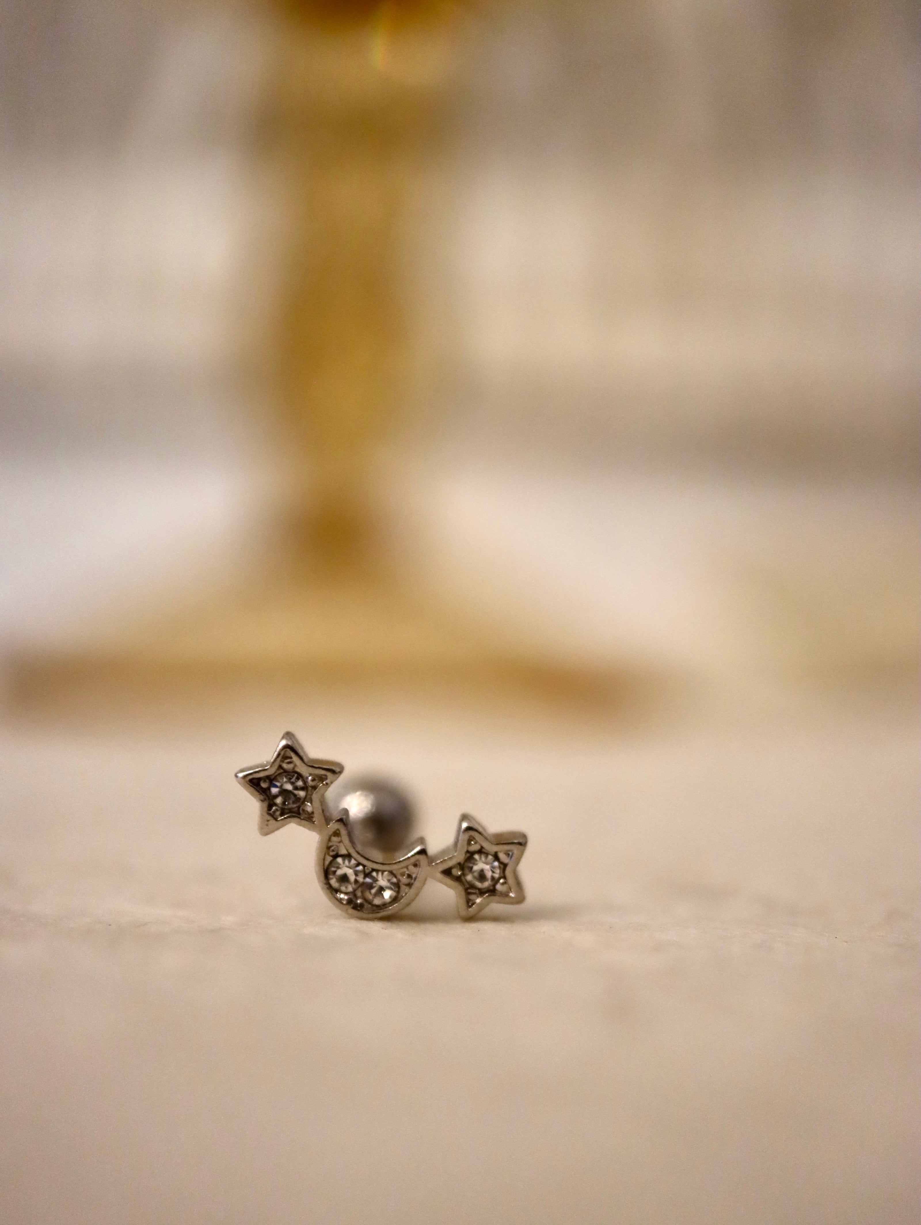 Curve bar star & crescent surgical steel piercing stud
