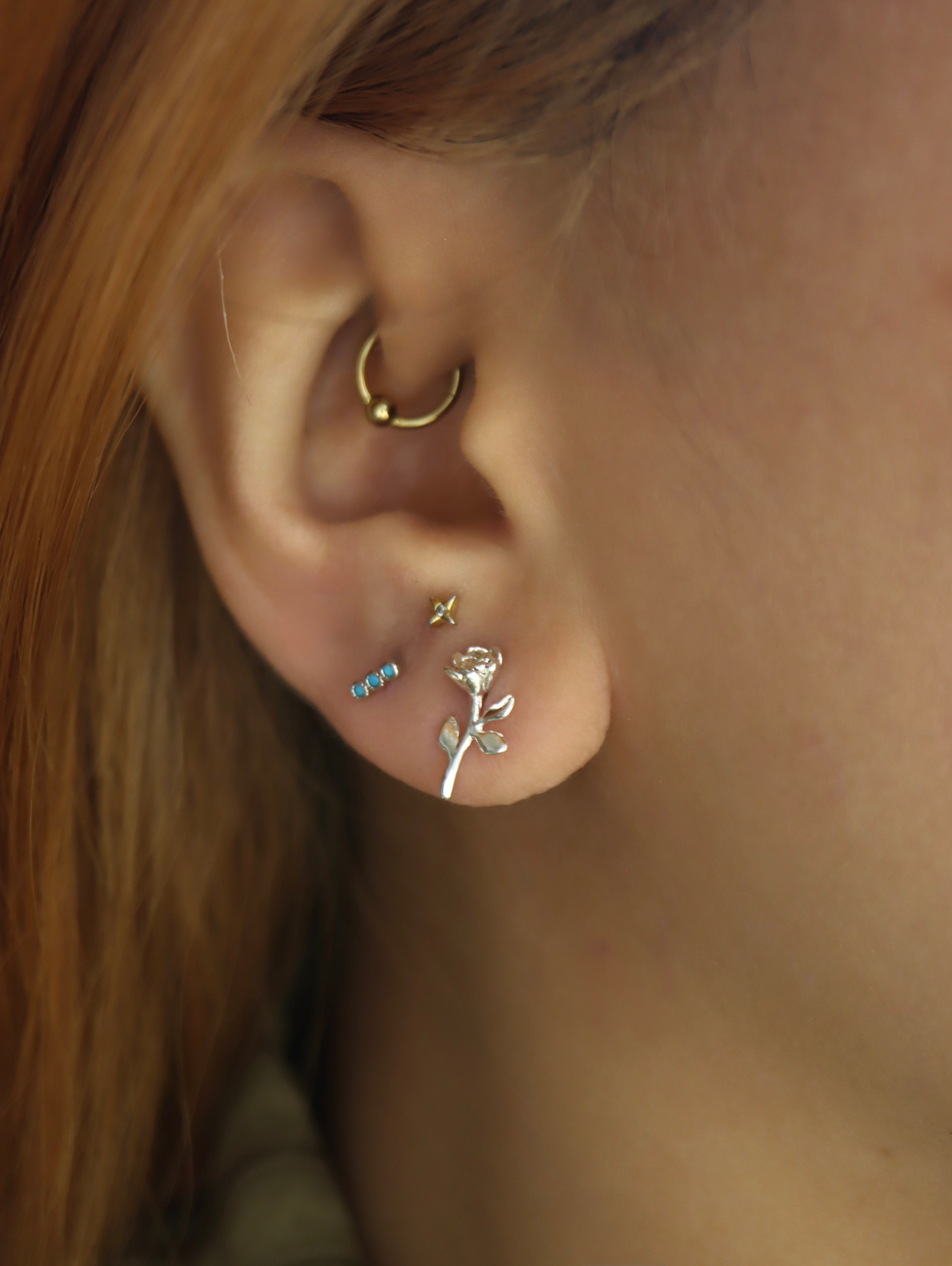 Rose silver tone earrings
