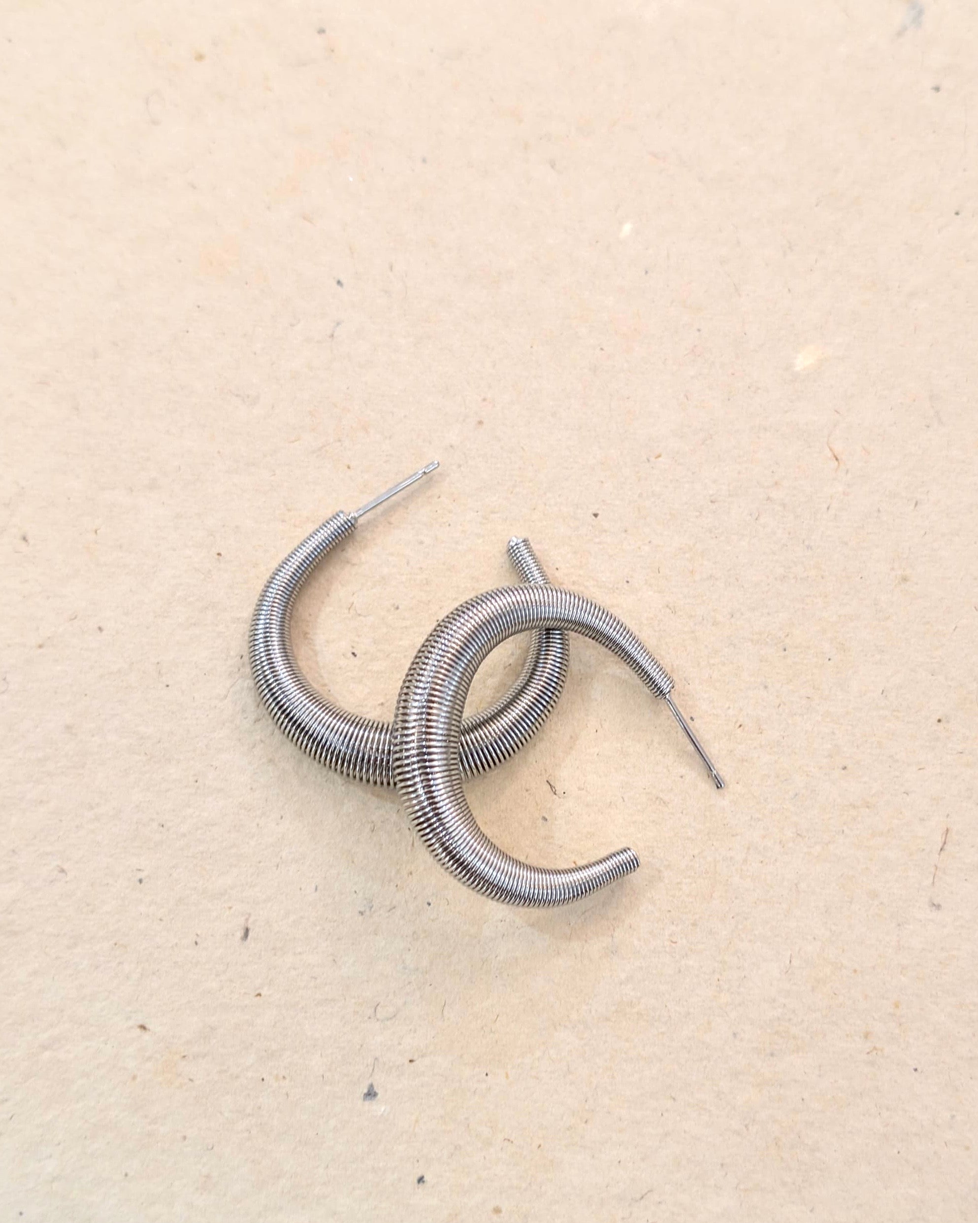 Coil steel hoop earrings