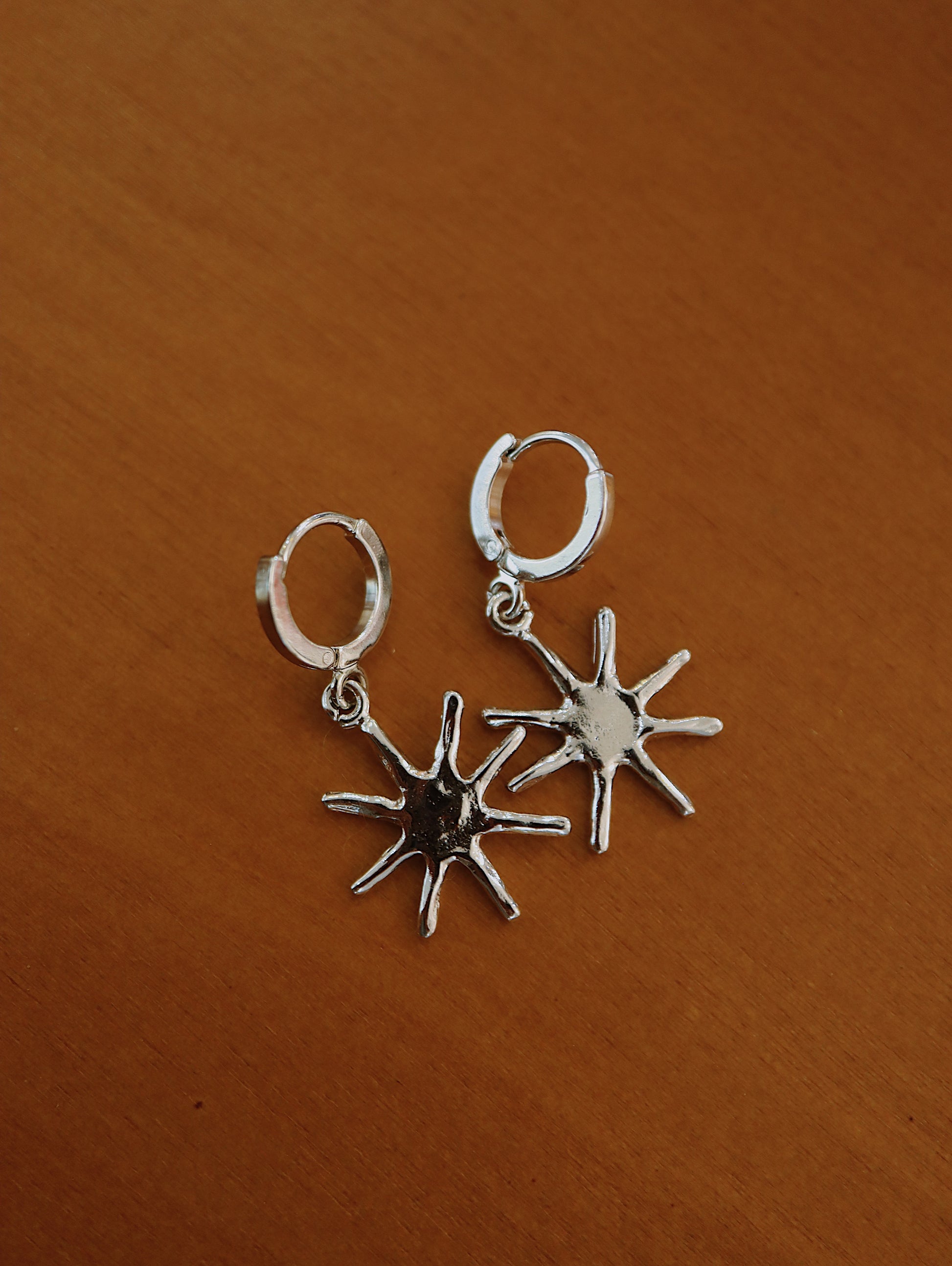 Drop sun hinged hoop earrings