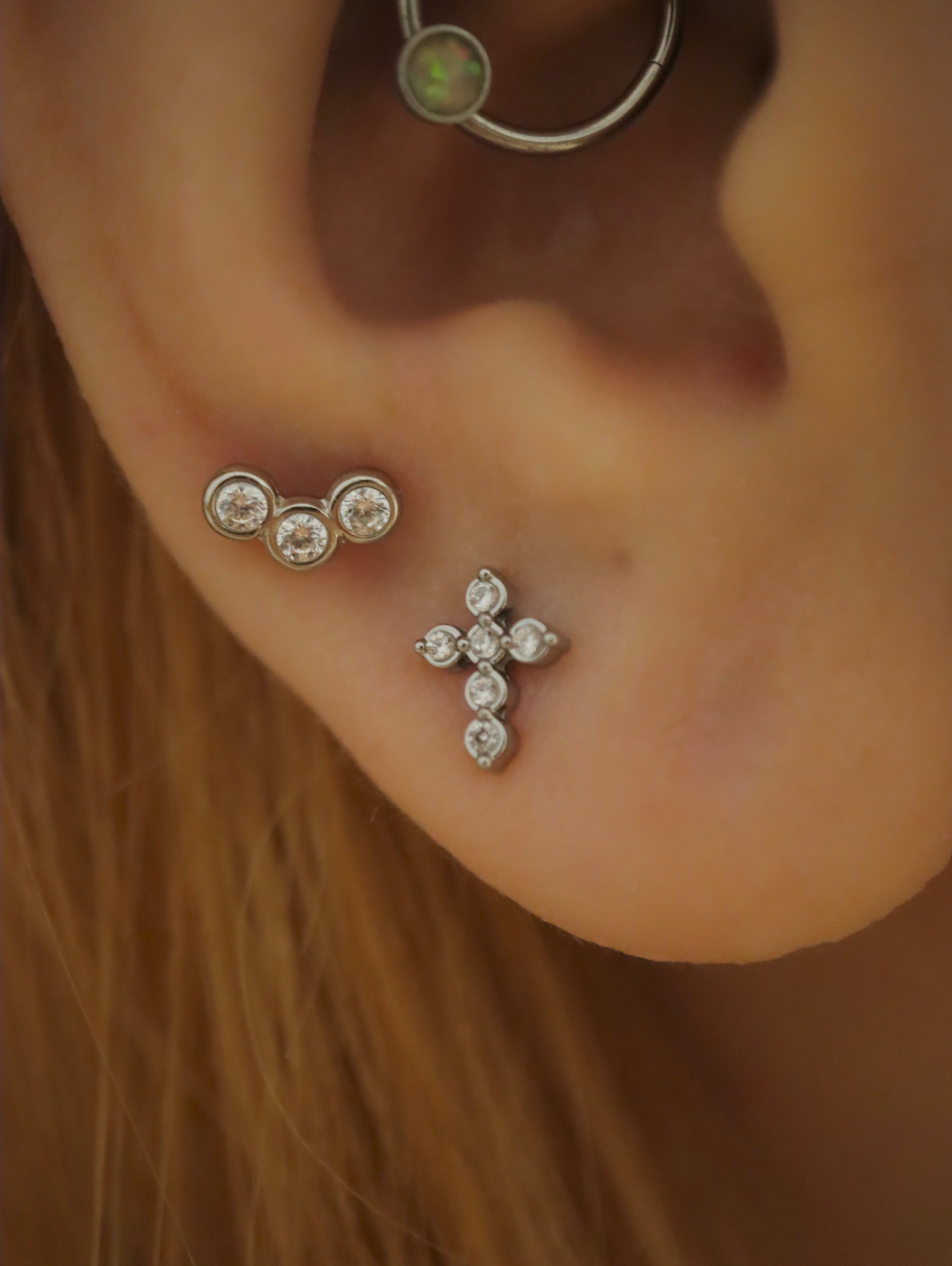 Triple cz surgical steel stud piercing