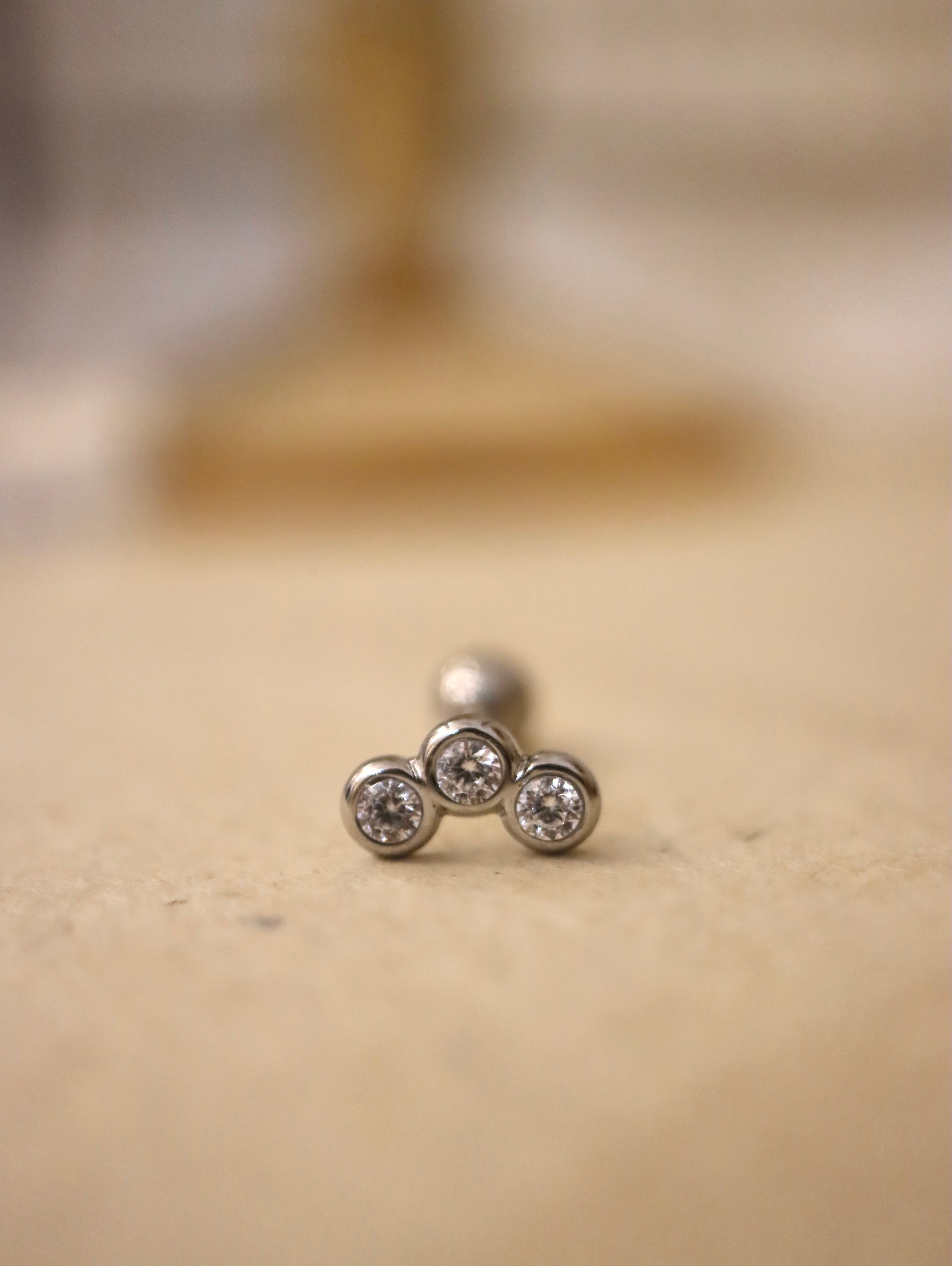 Triple cz surgical steel stud piercing