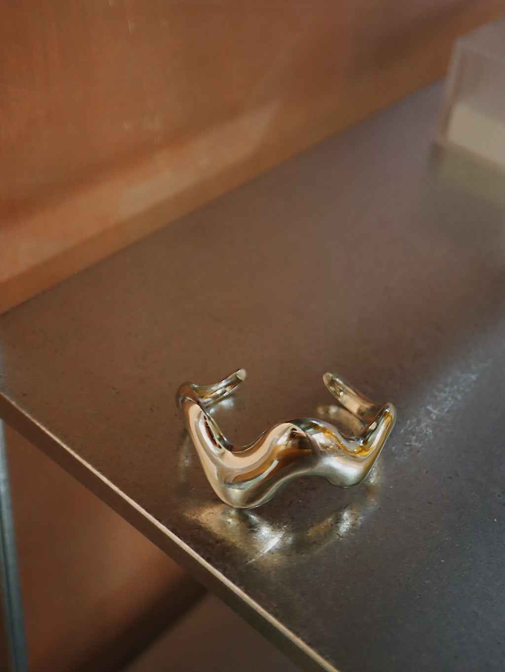 Wavy statement stainless steel bangle