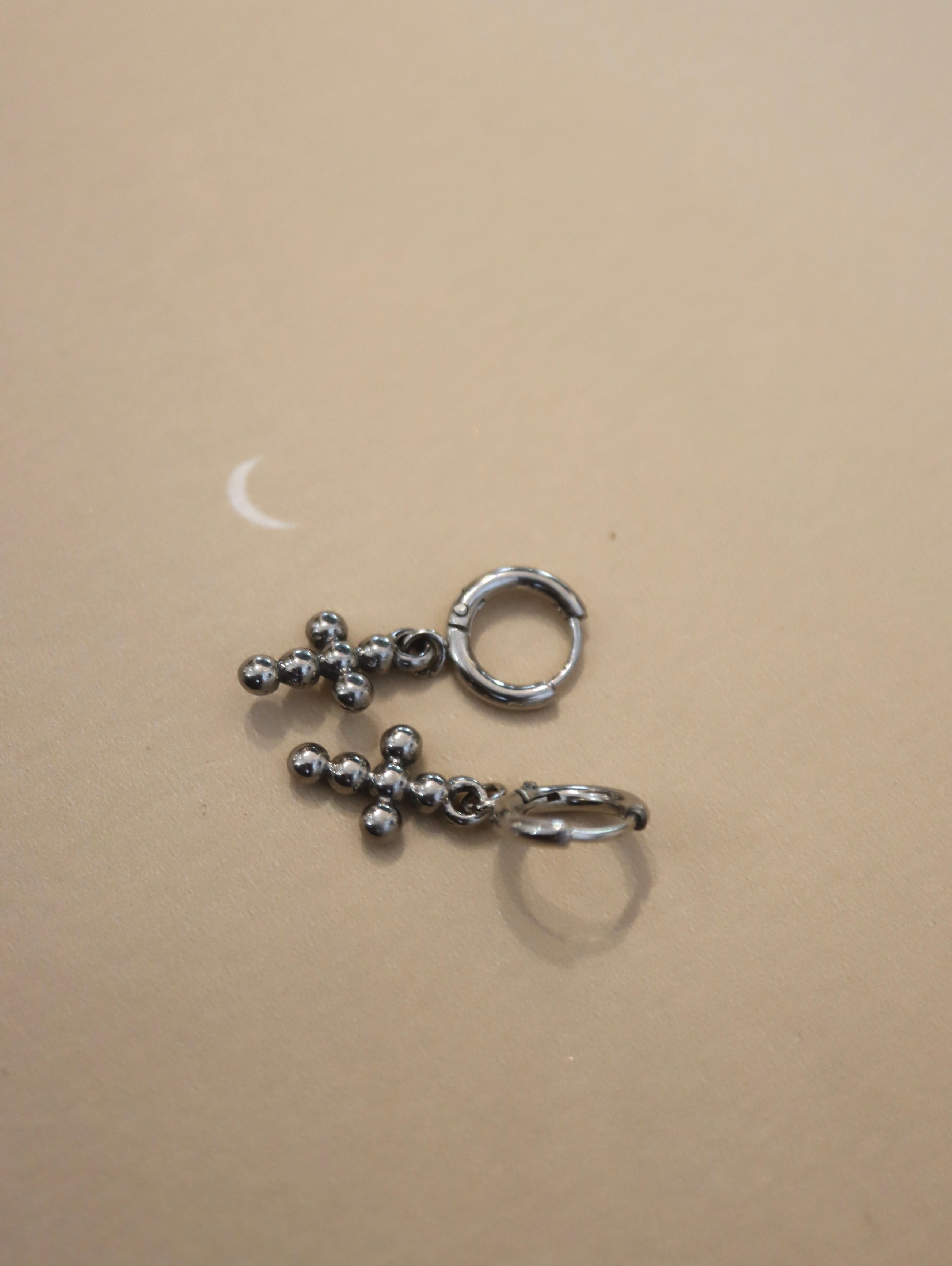 Hinged hoop drop cross earrings