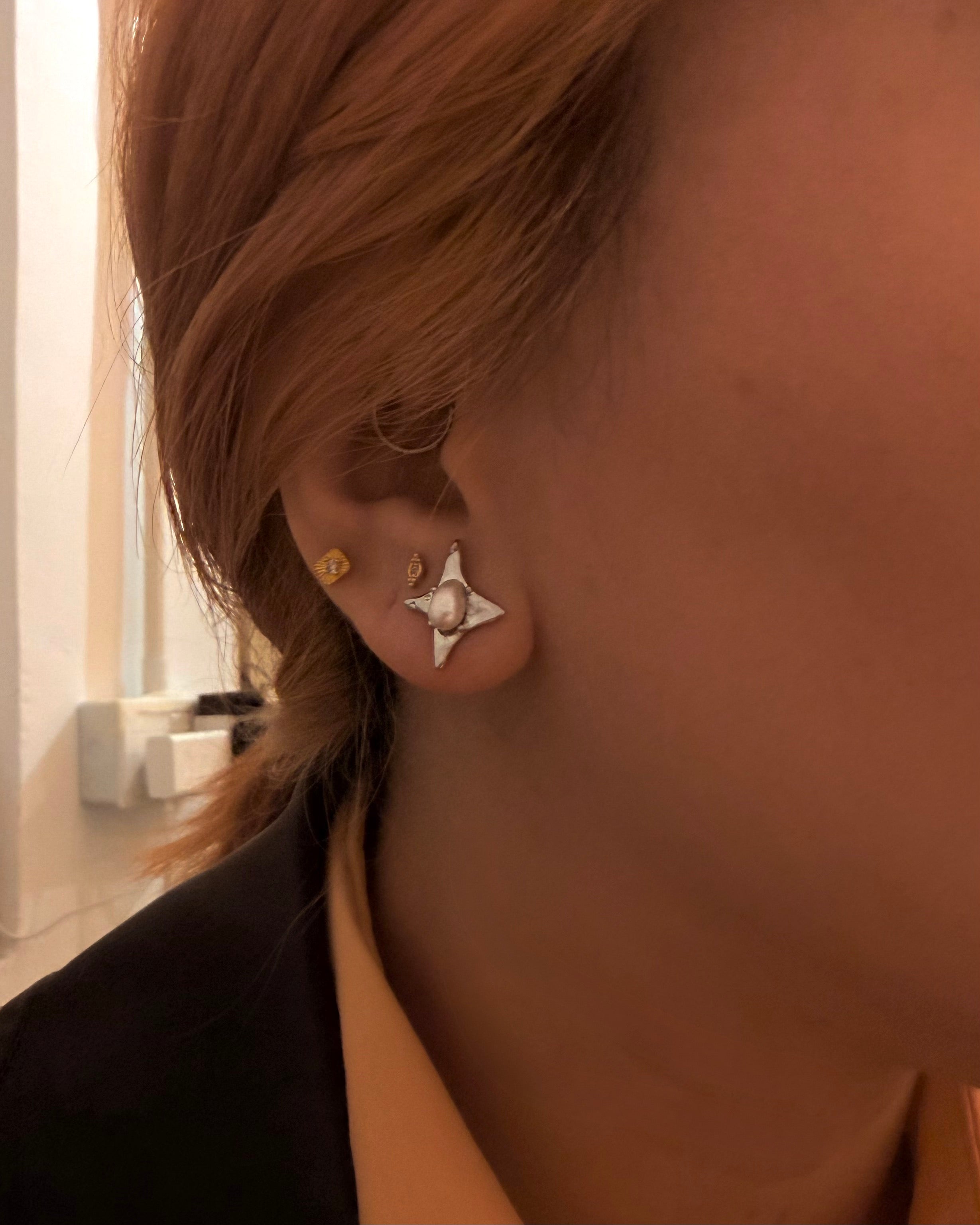 Cross pearl earring