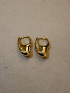 Irregular hoop brass earrings