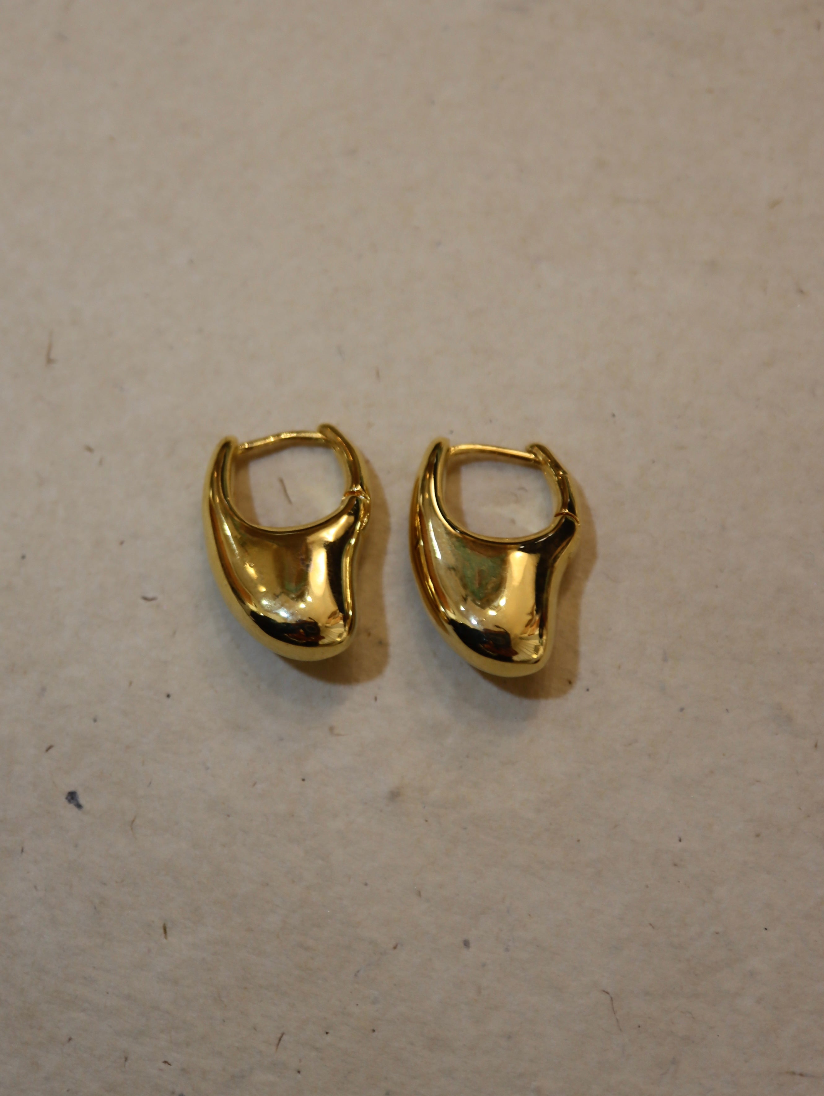 Irregular hoop brass earrings