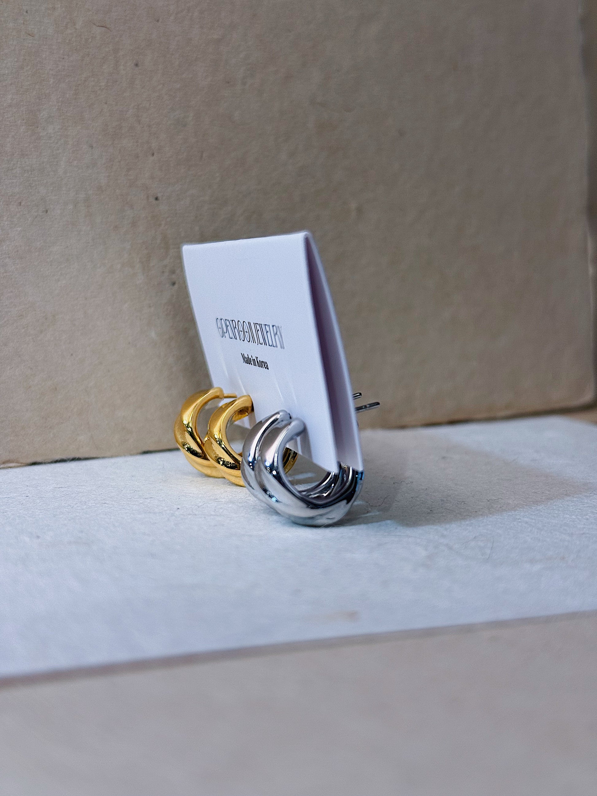Twisted hoop stainless steel earrings