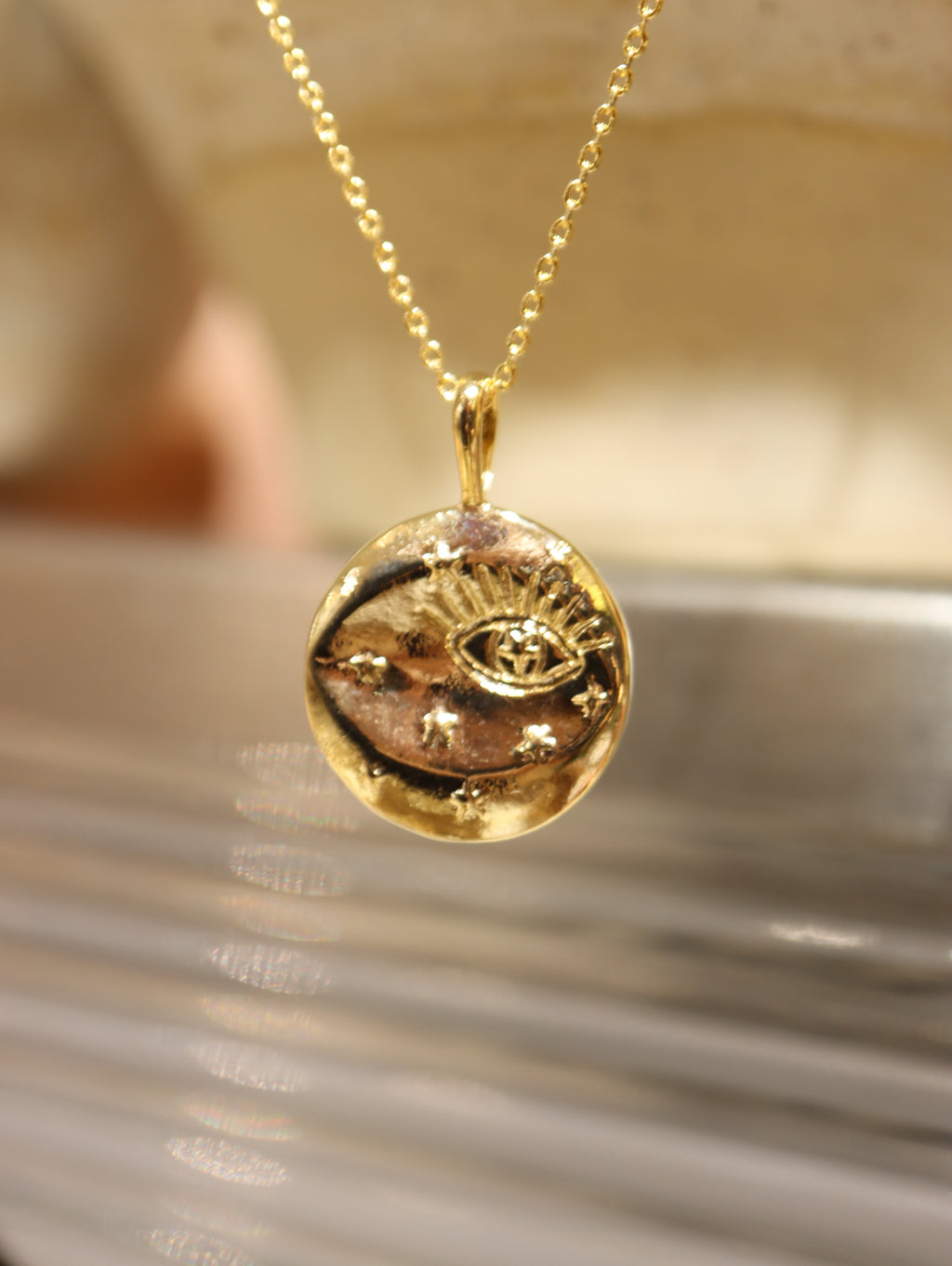 Eye coin brass necklace