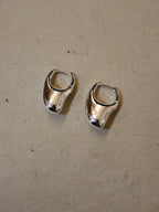 Irregular hoop brass earrings