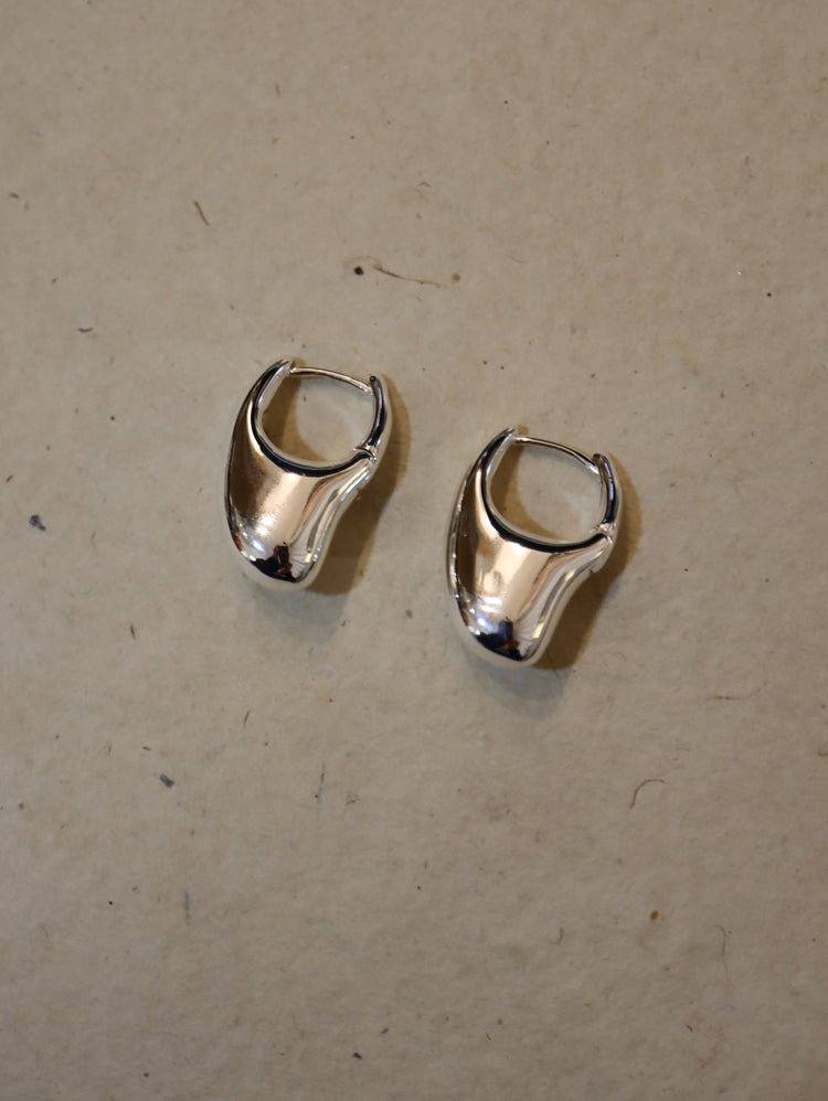 Irregular hoop brass earrings