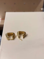 Golden twisted hoop earrings