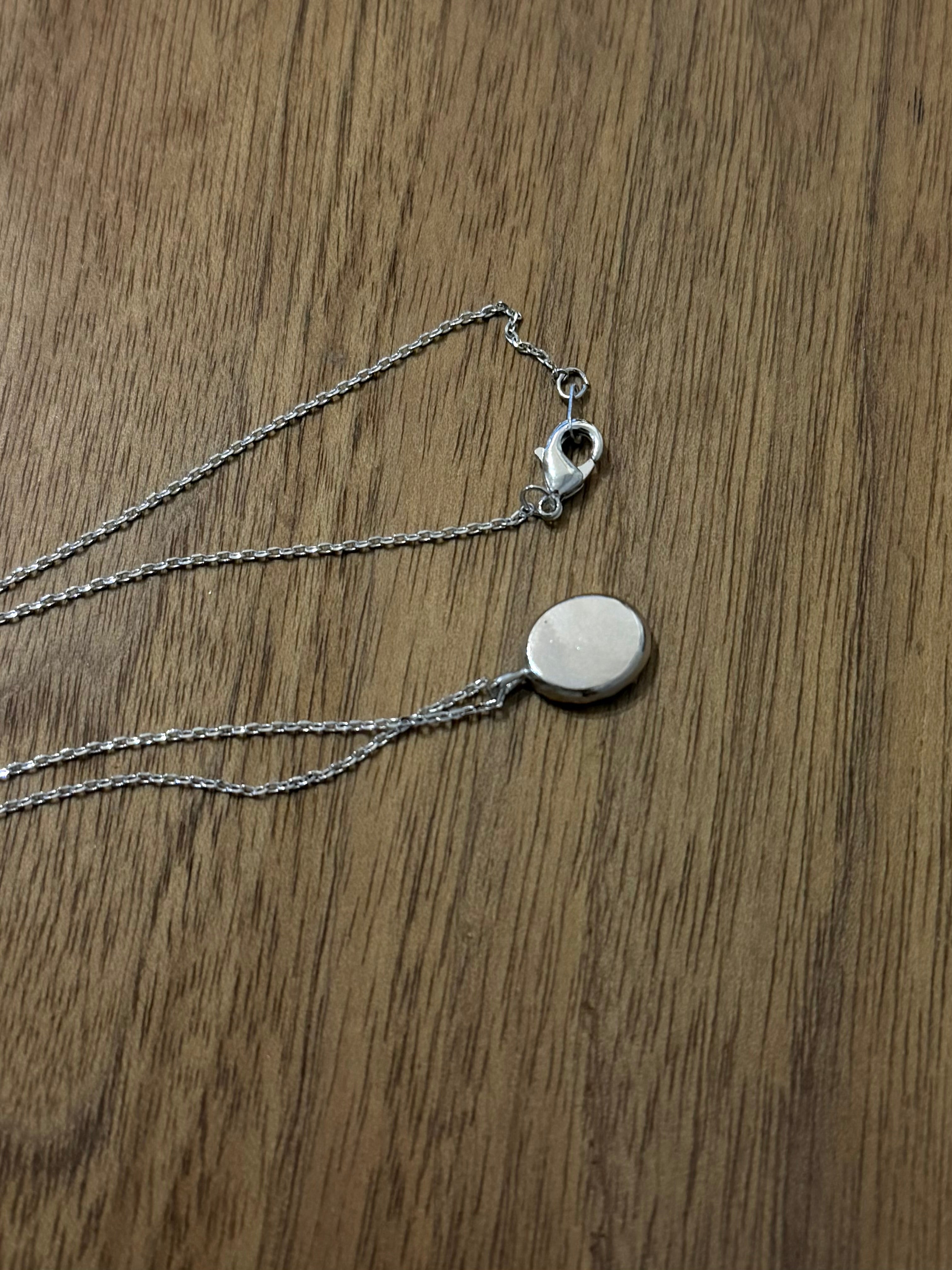 Oval sun ray brass necklace