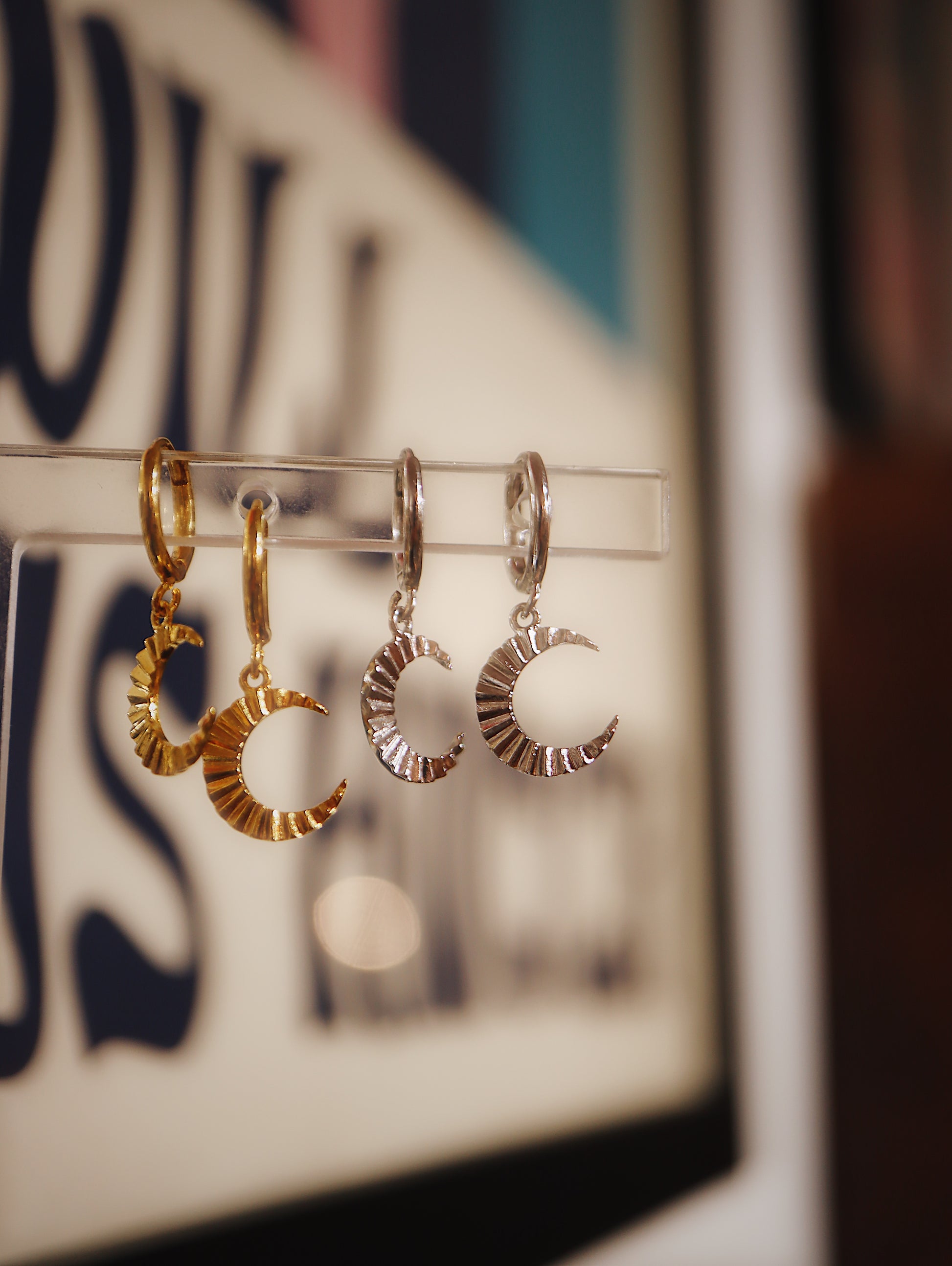 Hinged hoop drop crescent earrings