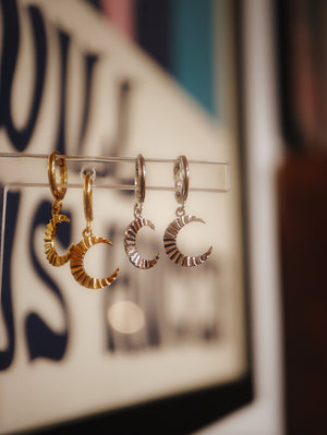 Hinged hoop drop crescent earrings
