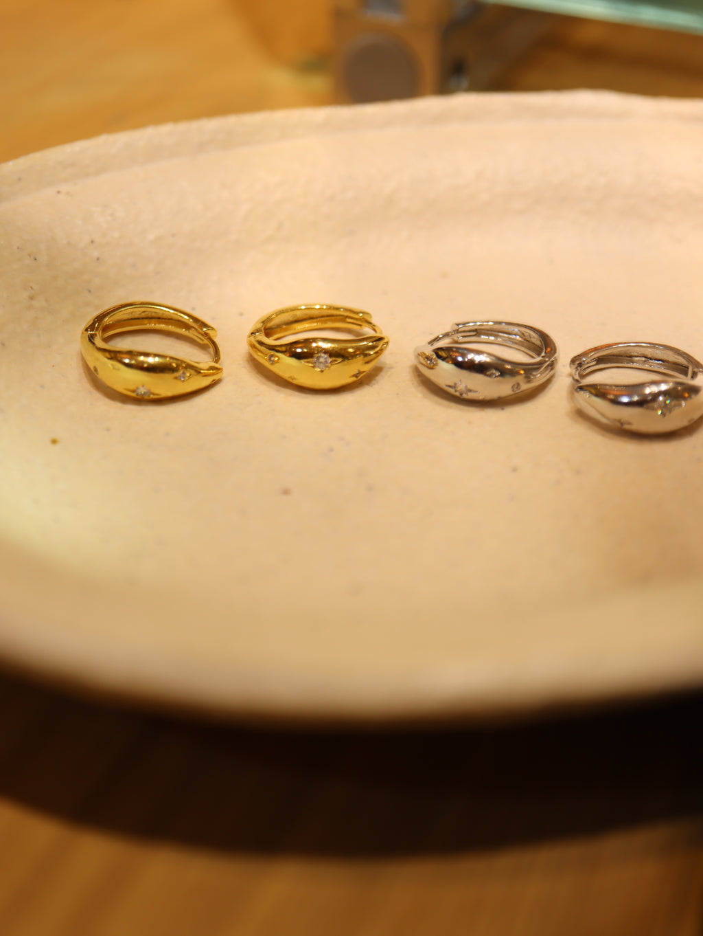 Sparkling cz hinged hoop earrings