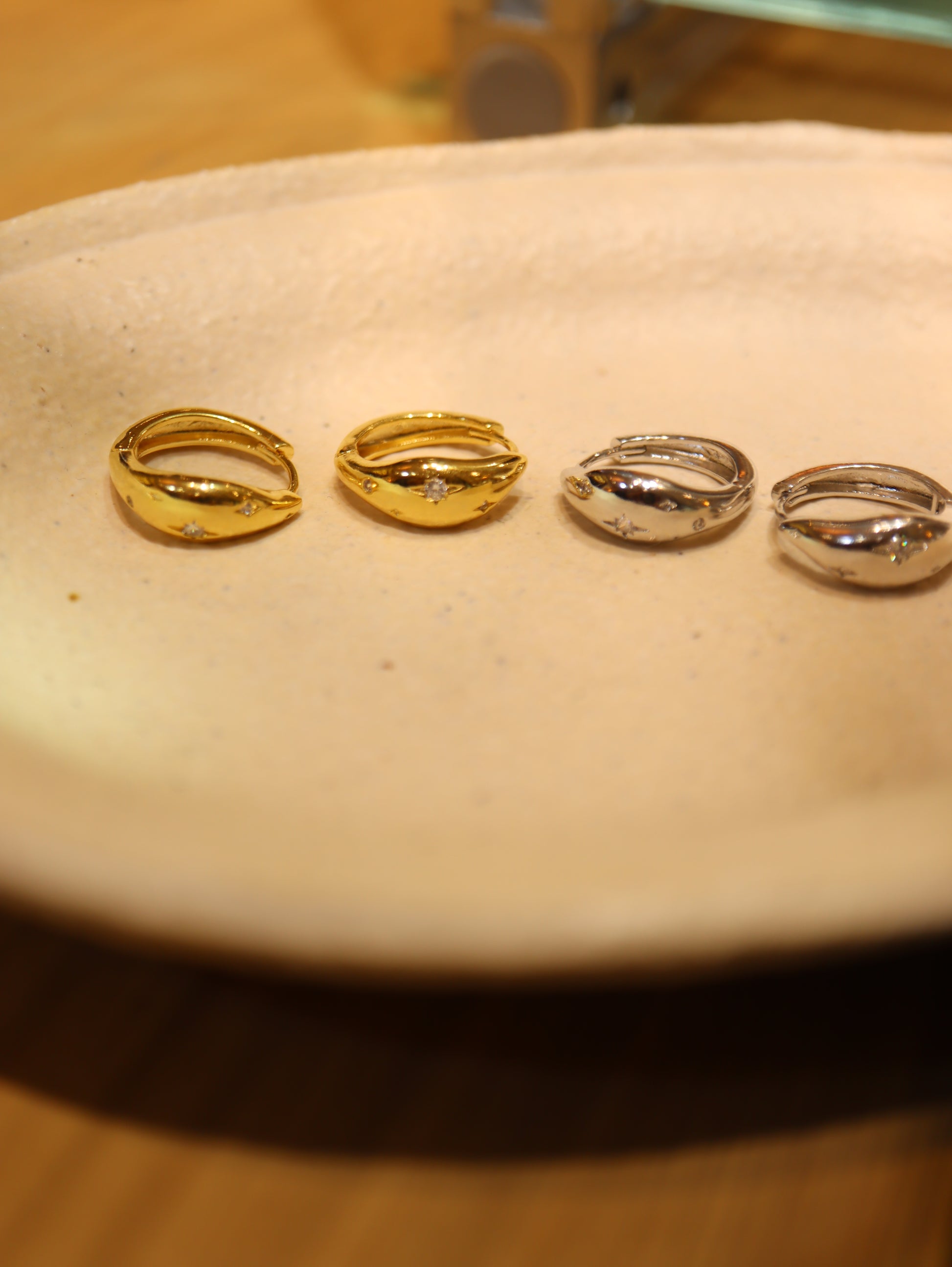 Sparkling cz hinged hoop earrings