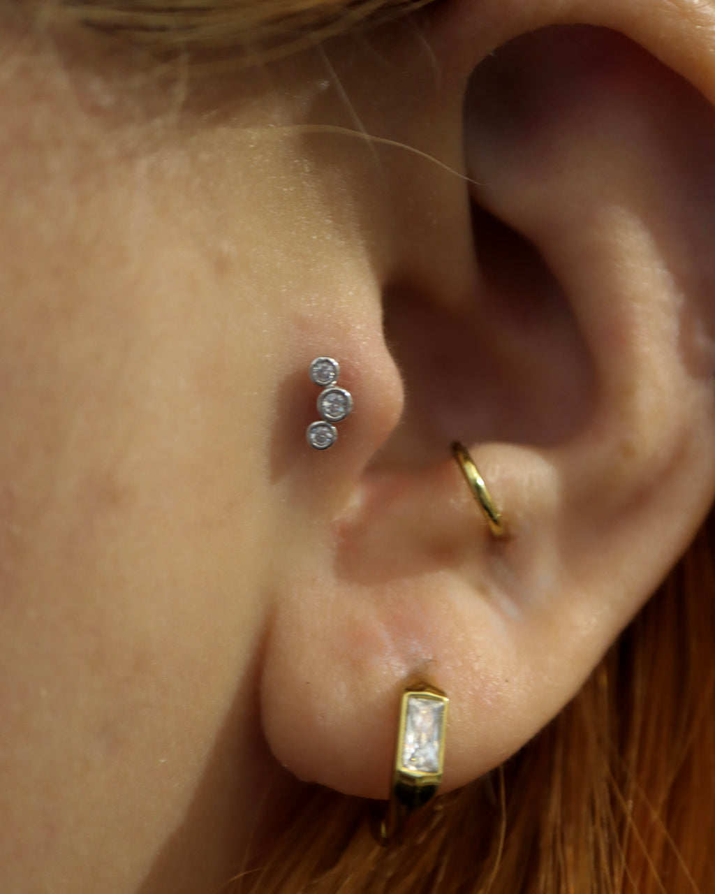 Triple cz surgical steel stud earring