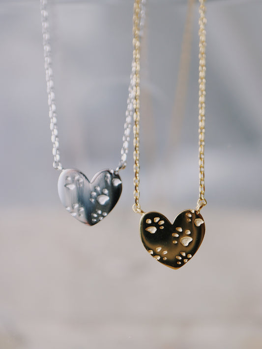 Paws on heart brass necklace