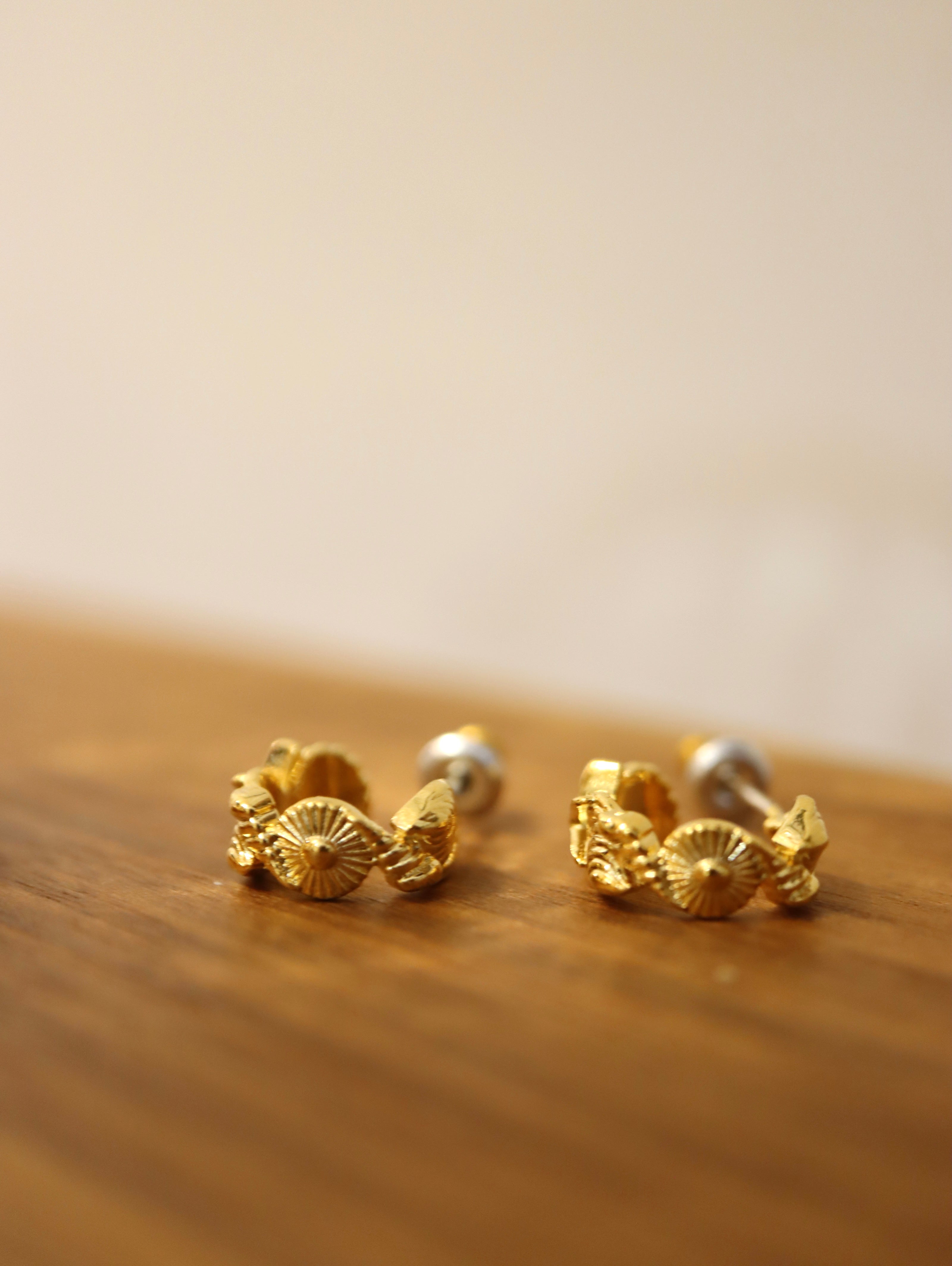 Solis textured hoop brass earrings