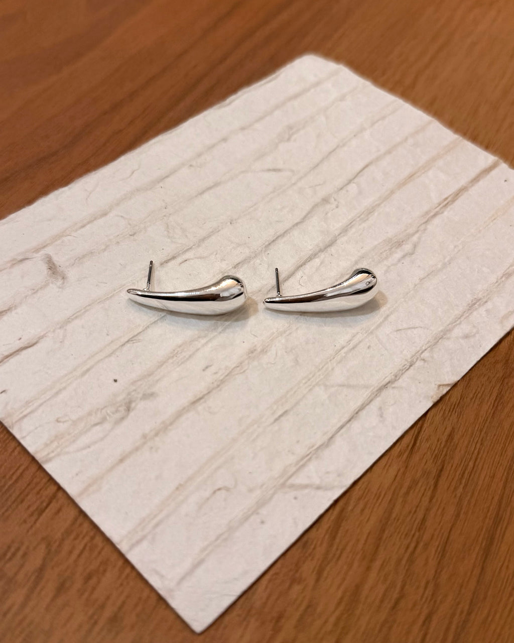 Water drop brass earrings