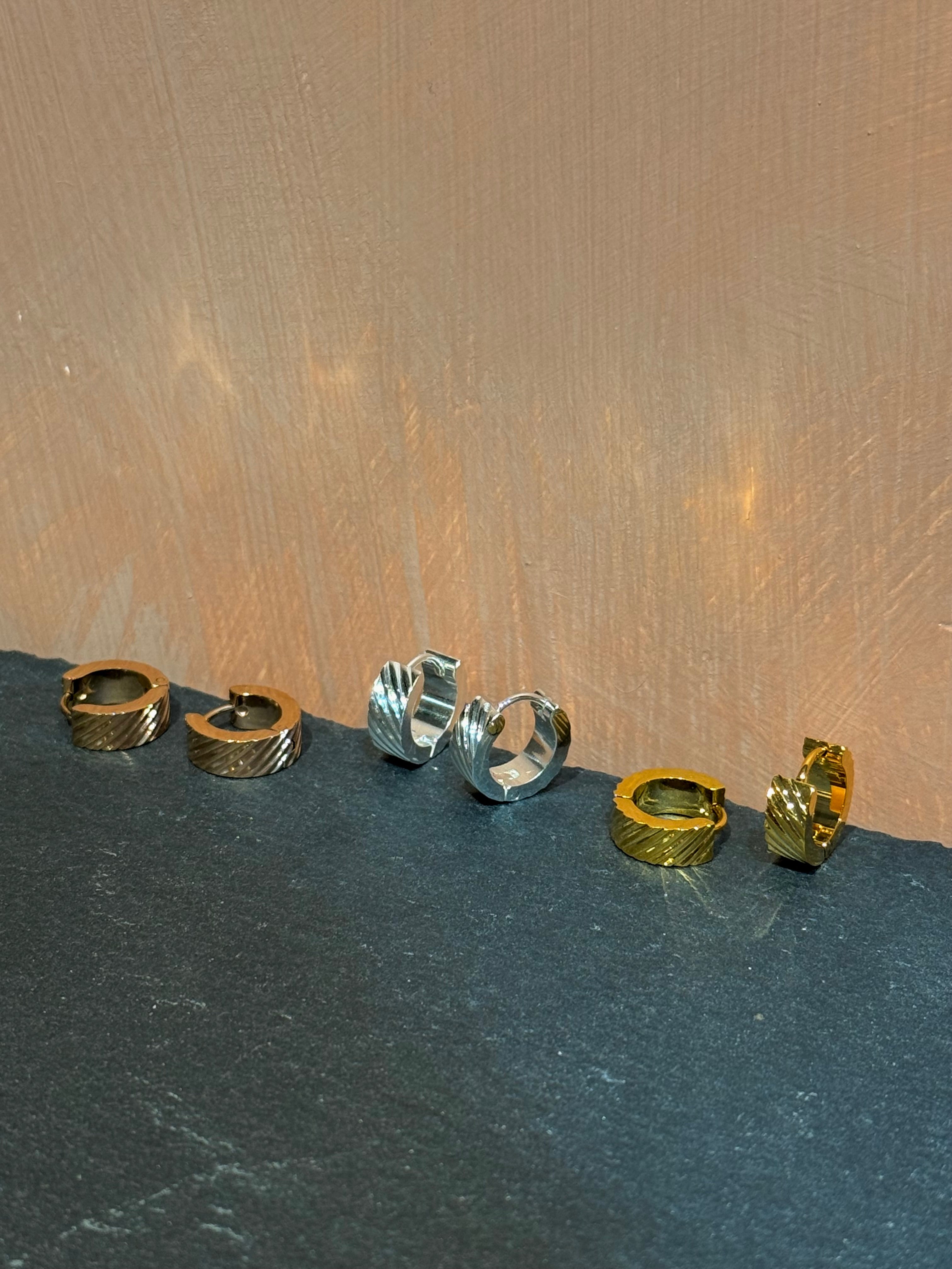 Surgical steel flat hinged hoop earrings