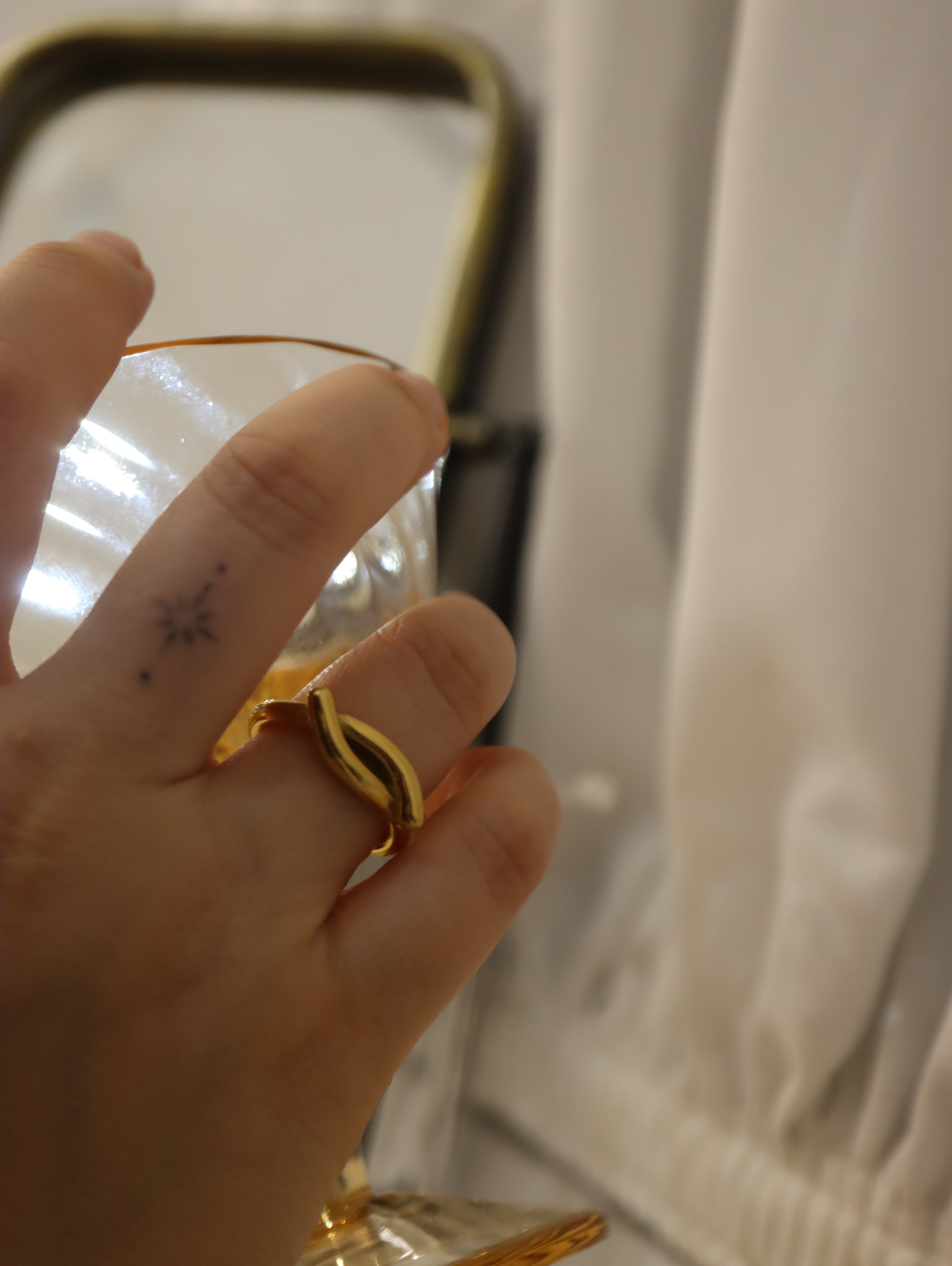 Wavy stainless steel ring