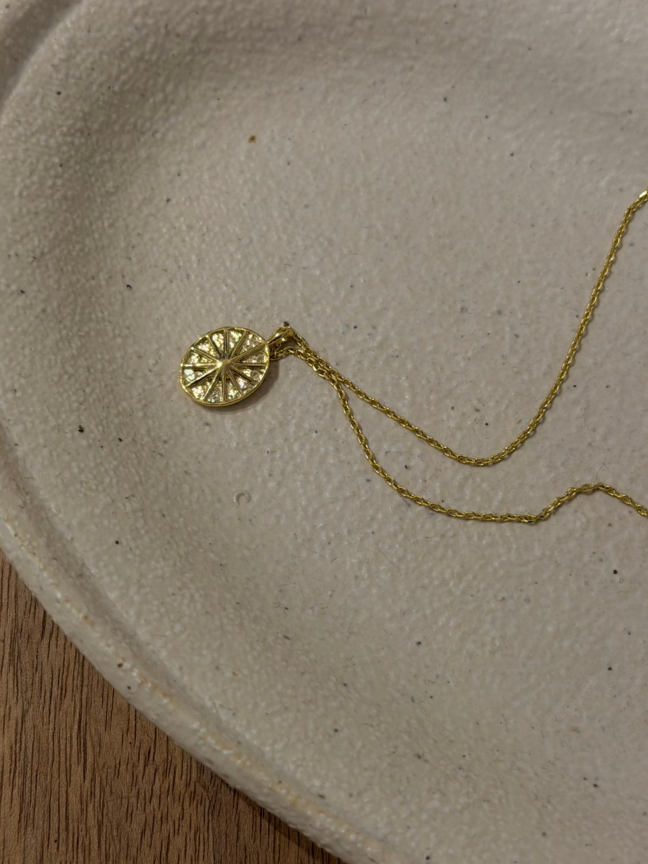 Oval sun ray brass necklace
