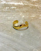 Bold wavy stainless steel bangle