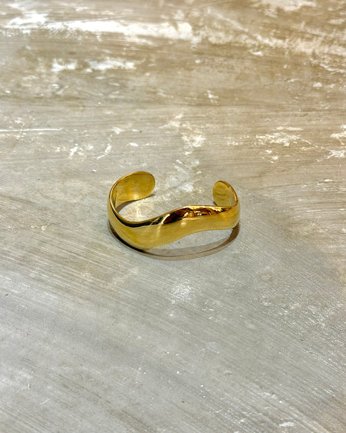 Bold wavy stainless steel bangle cuff