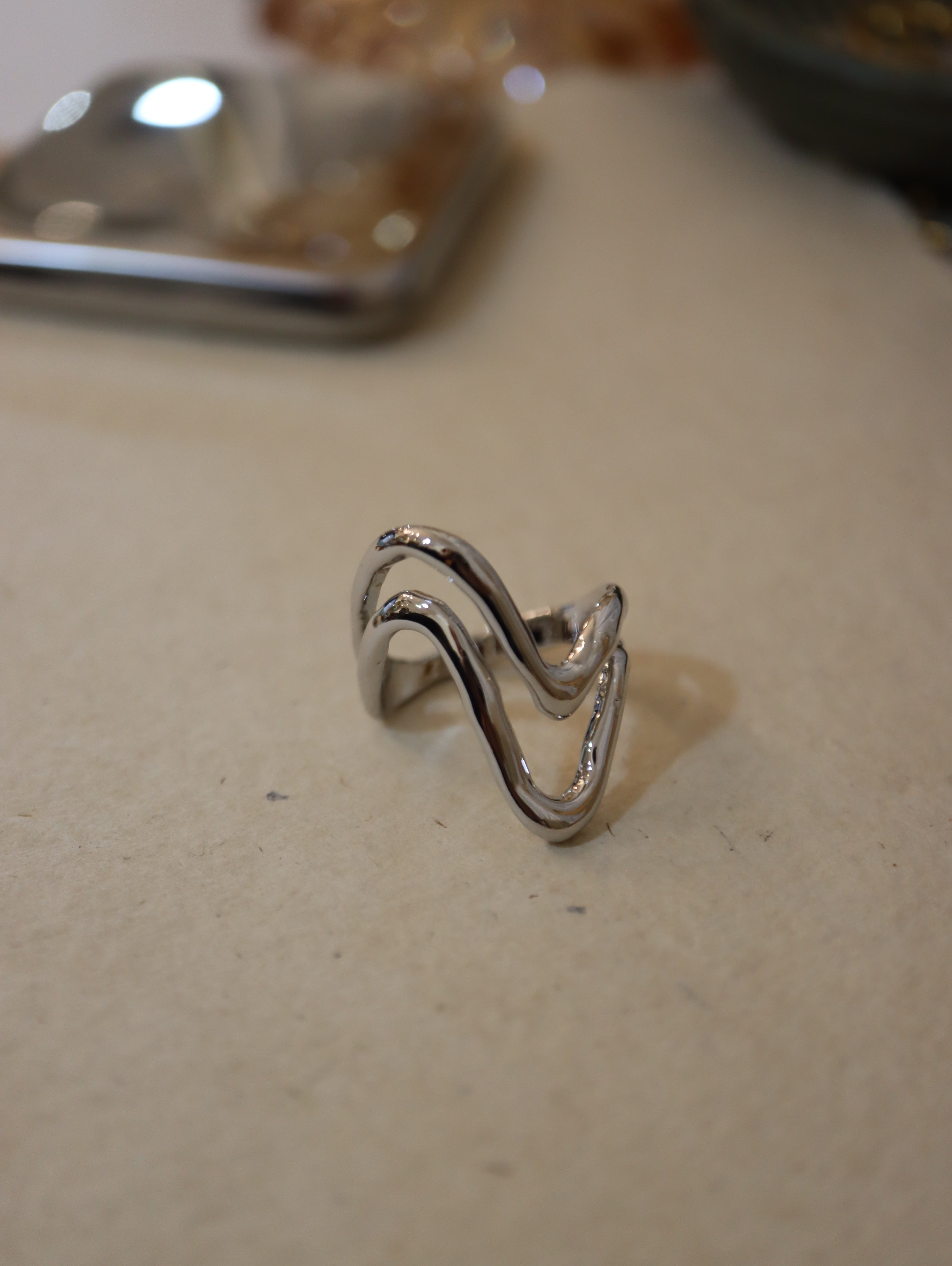 Wavy bold brass ring