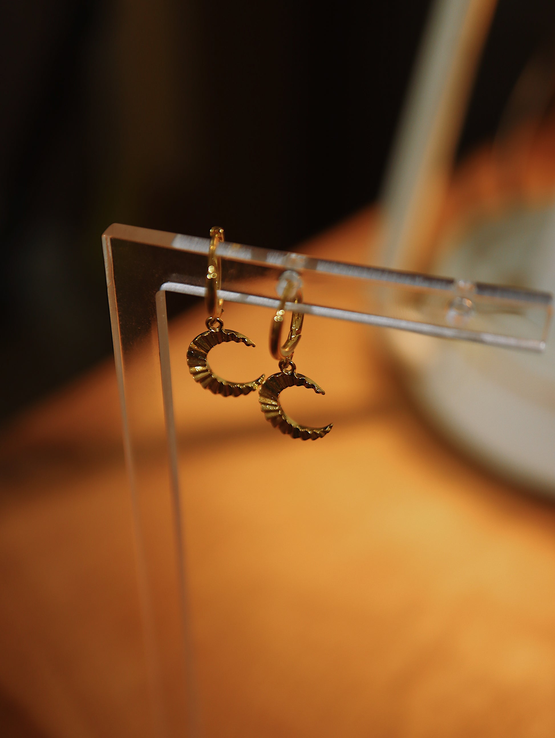 Hinged hoop drop crescent earrings