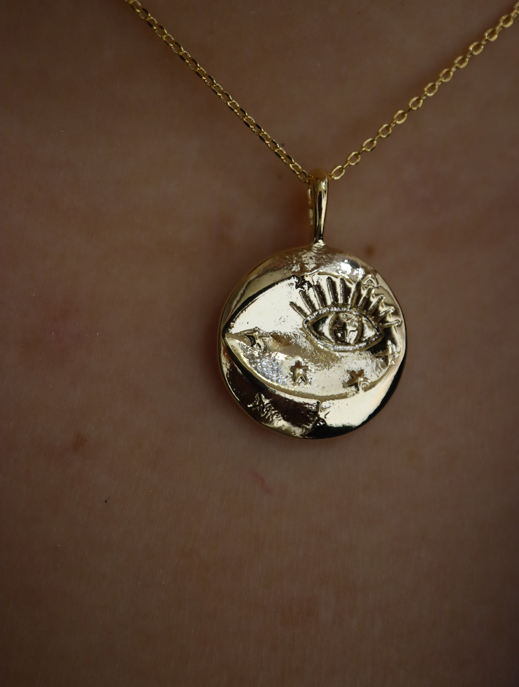 Eye coin brass necklace